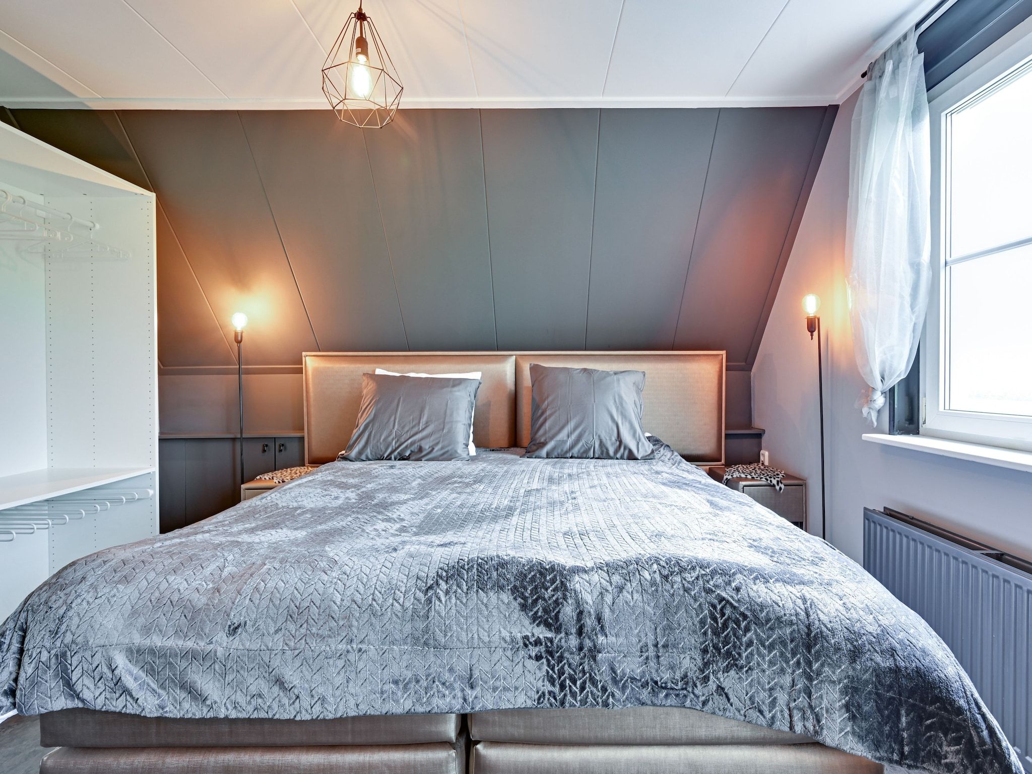 Een slaapkamer van Villa Didam in Didam