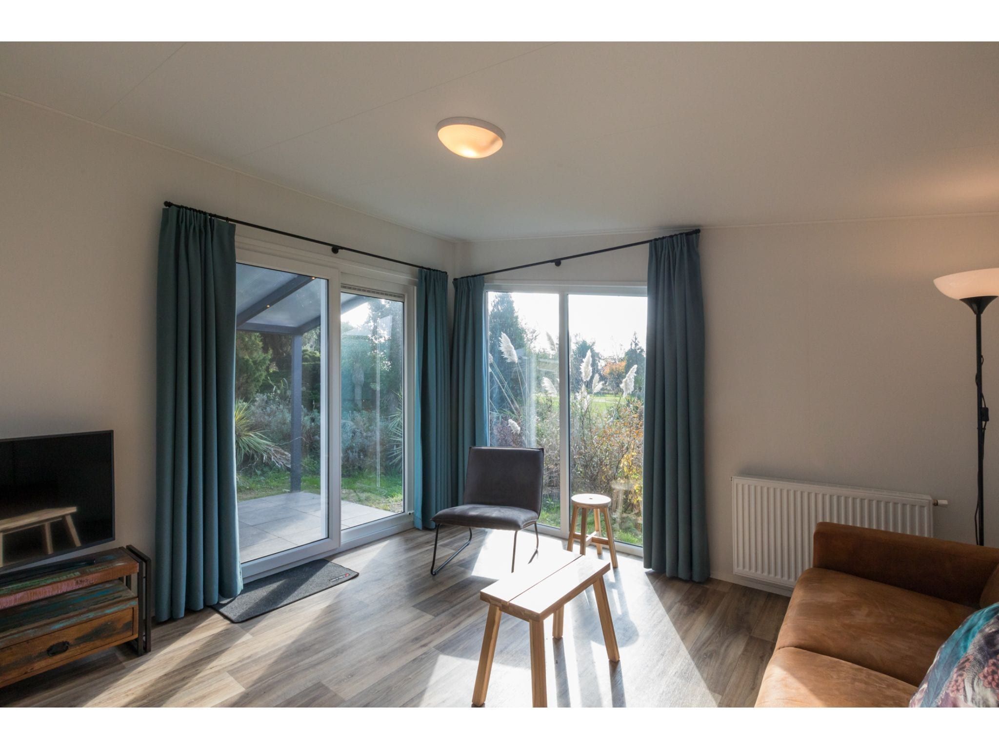 De woonkamer van Fort den Haak - Chalet 1 tm 15  hond in Vrouwenpolder