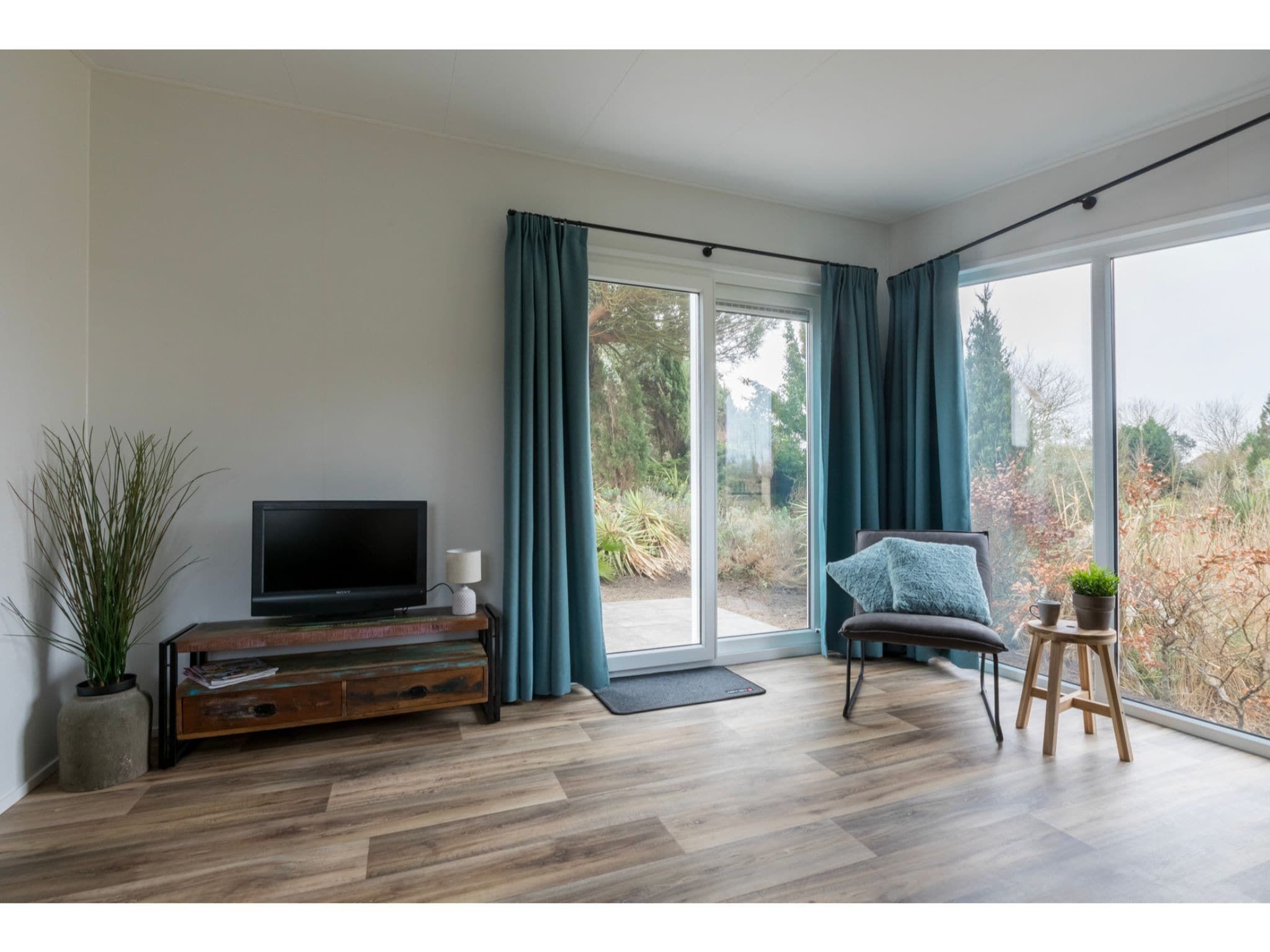 De woonkamer van Fort den Haak - Chalet 1 t/m 10 huisdiervrij in Vrouwenpolder