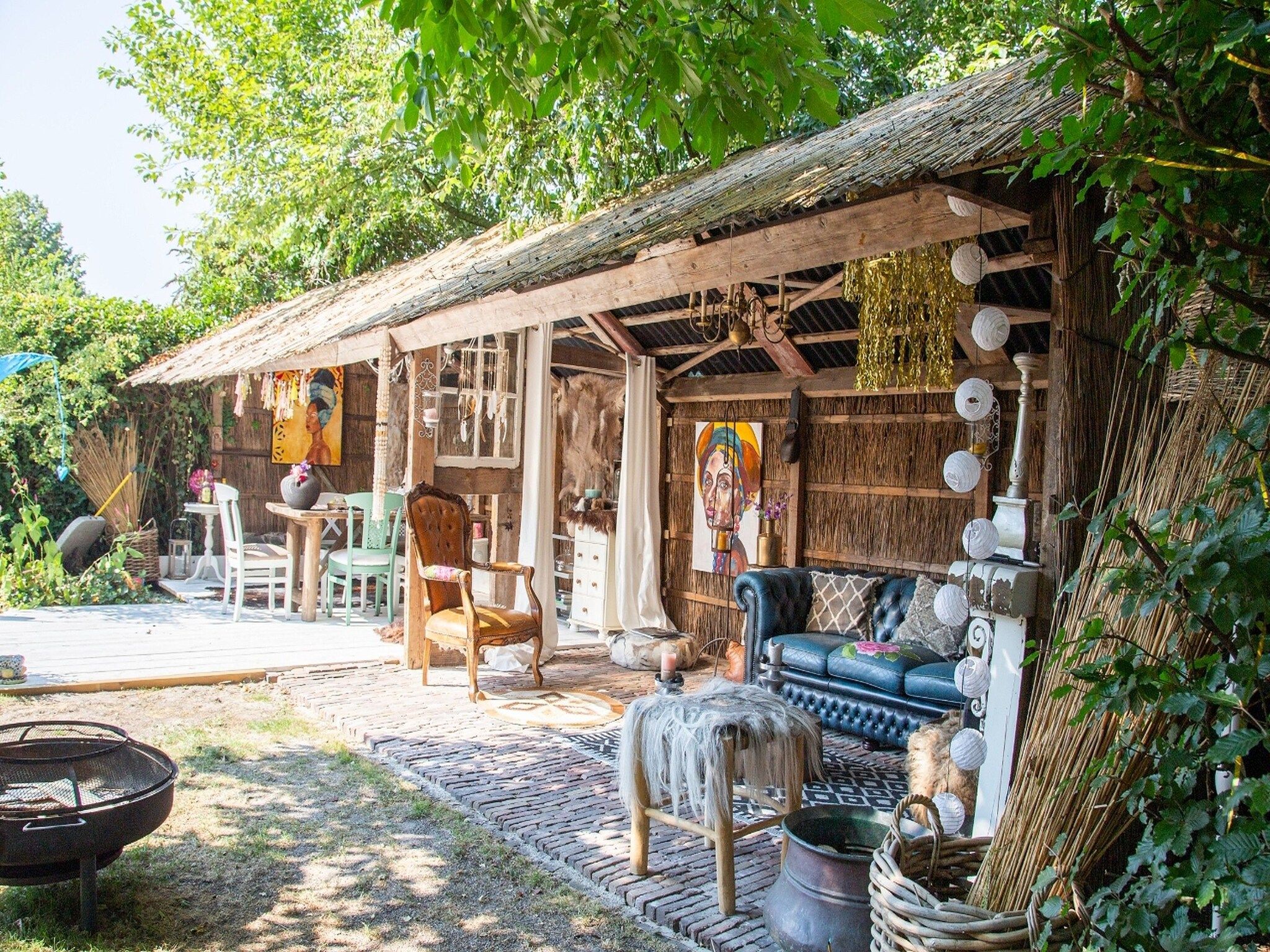 De tuin van Vakantiehuis 'Het Atelier' in Sleen