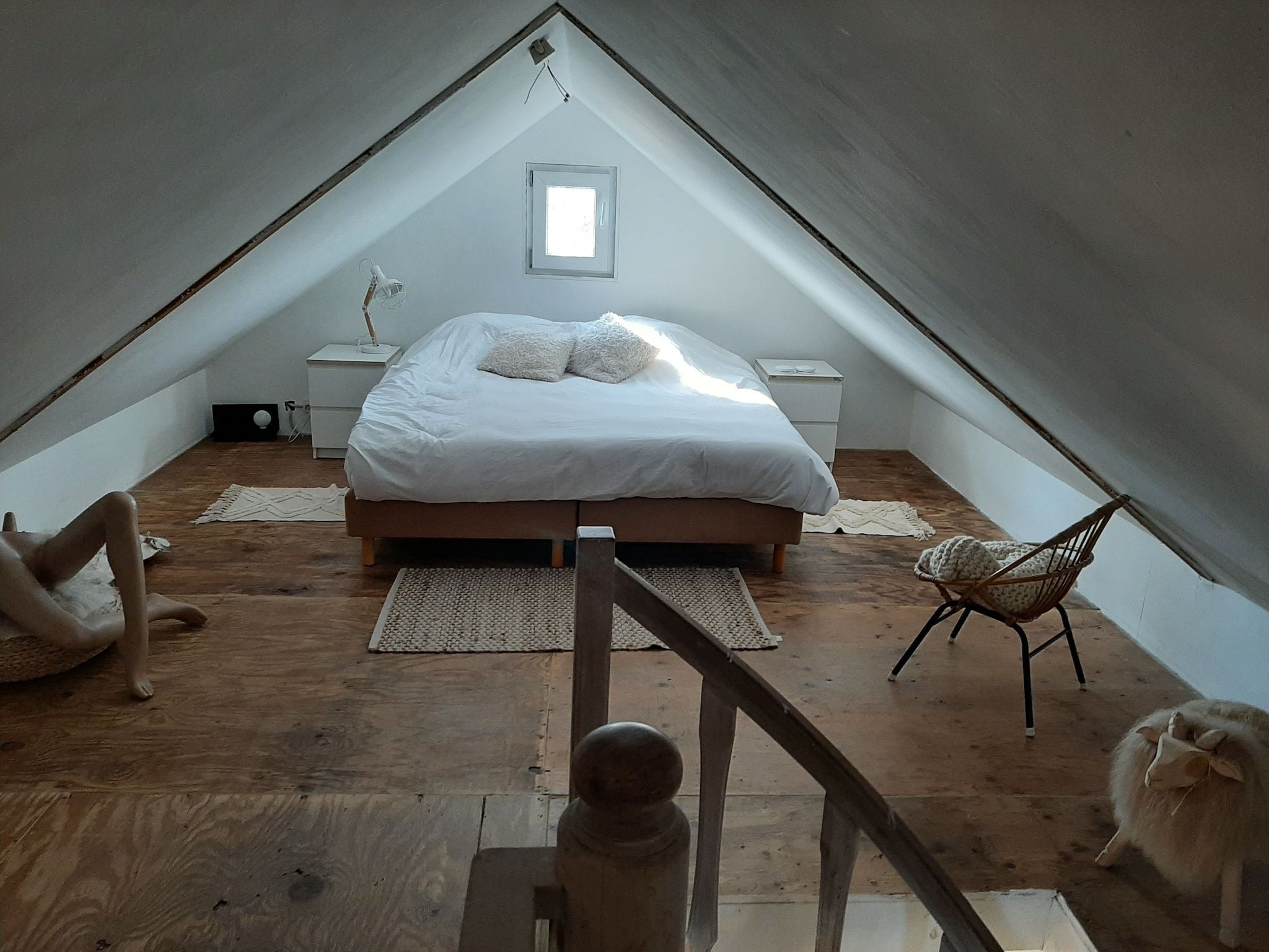 Een slaapkamer van Vakantiehuis 'Het Atelier' in Sleen