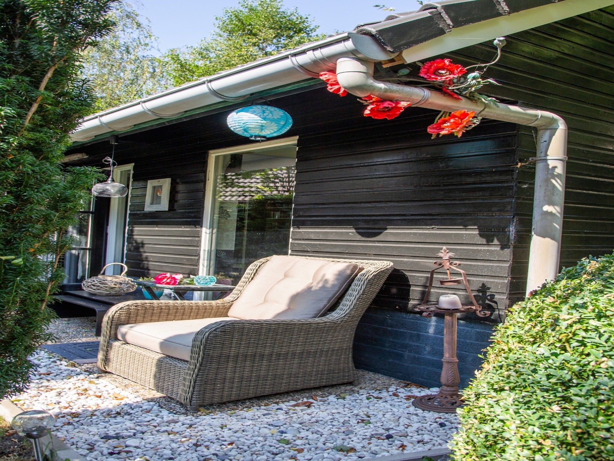 De tuin van Vakantiehuis 'Het Atelier' in Sleen