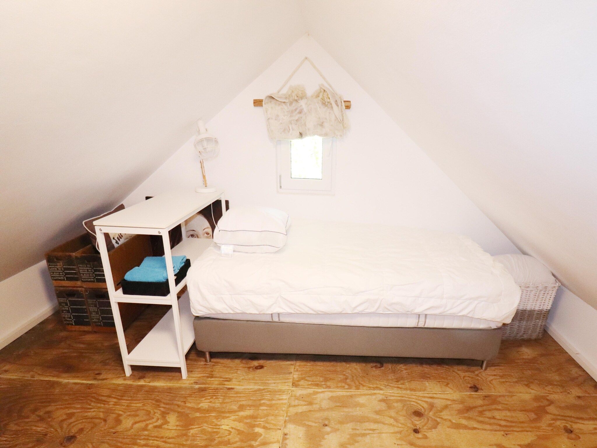 Een slaapkamer van Vakantiehuis 'Het Atelier' in Sleen