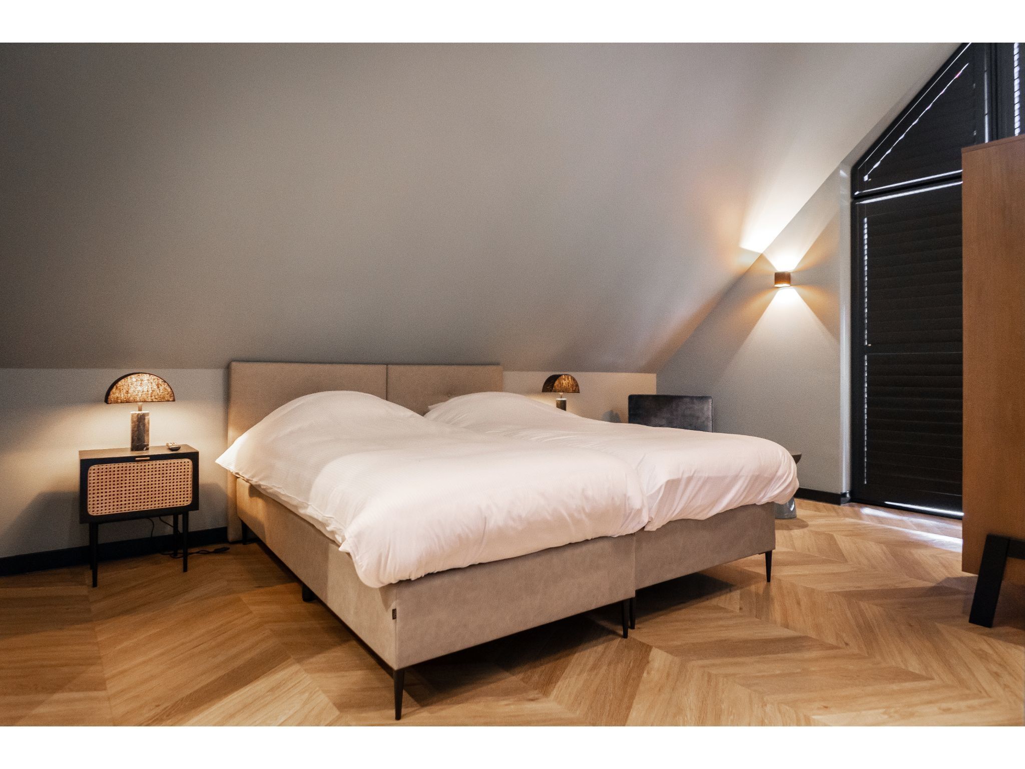 Een slaapkamer van Buytenveldt H4 in De Cocksdorp Texel