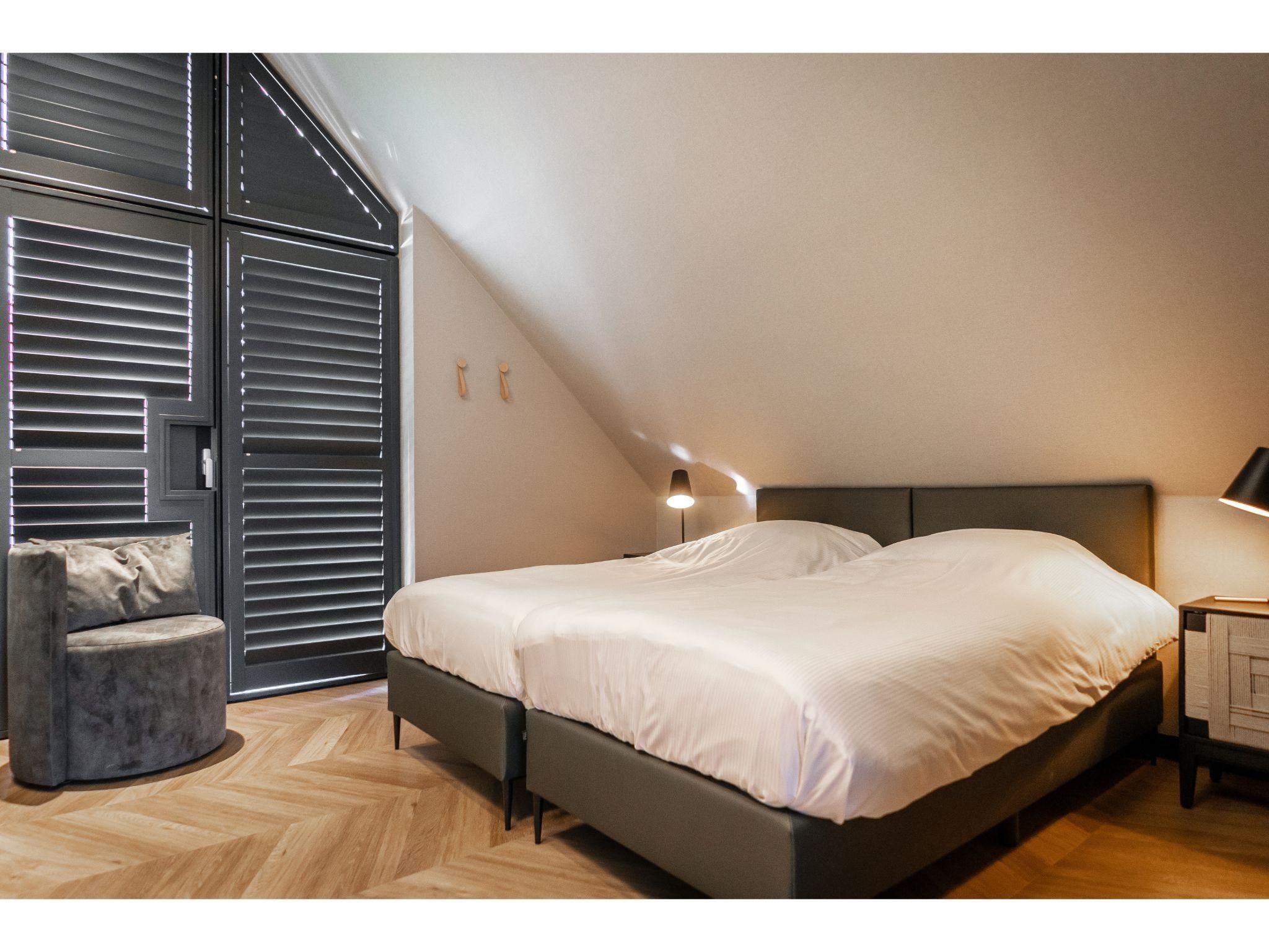 Een slaapkamer van Buytenveldt H6 in De Cocksdorp Texel