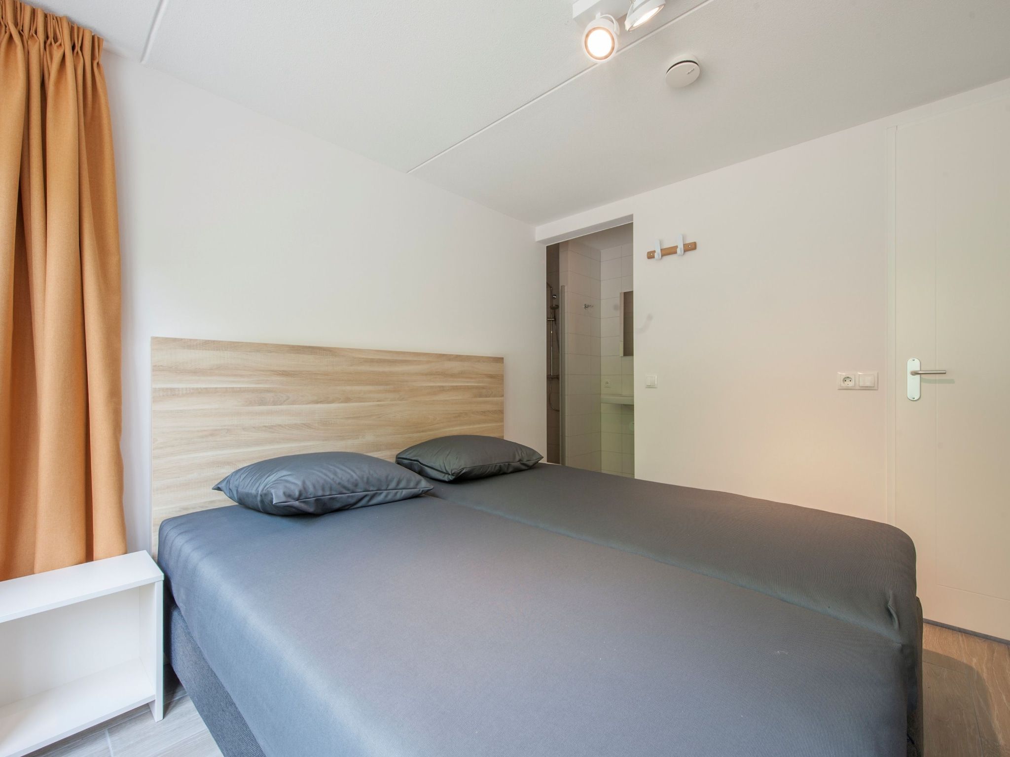 Een slaapkamer van Noordzee Résidence Dishoek 14 in Kamperland