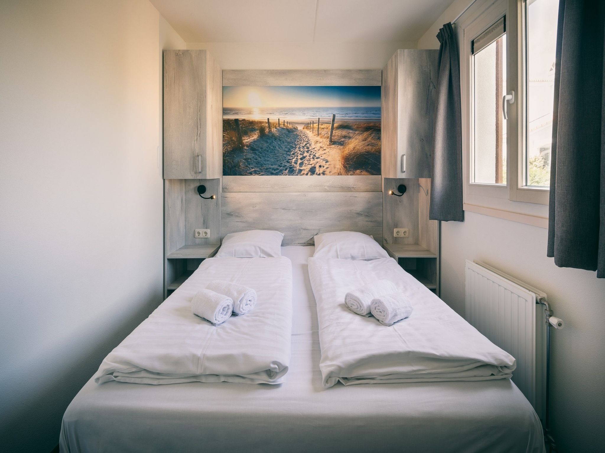 Een slaapkamer van Duinresort Dunimar 2 in Noordwijkerhout