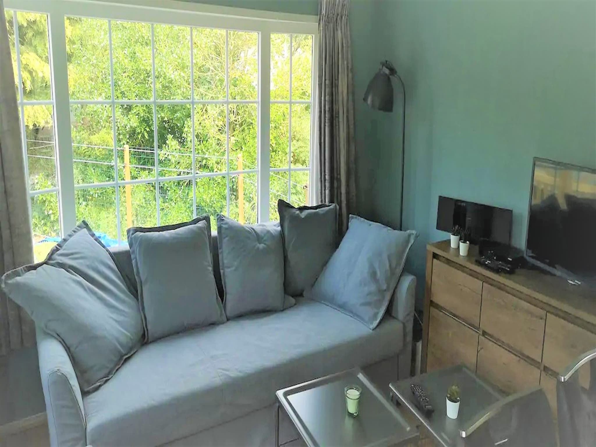 De woonkamer van Huisje 84 in Stegeren