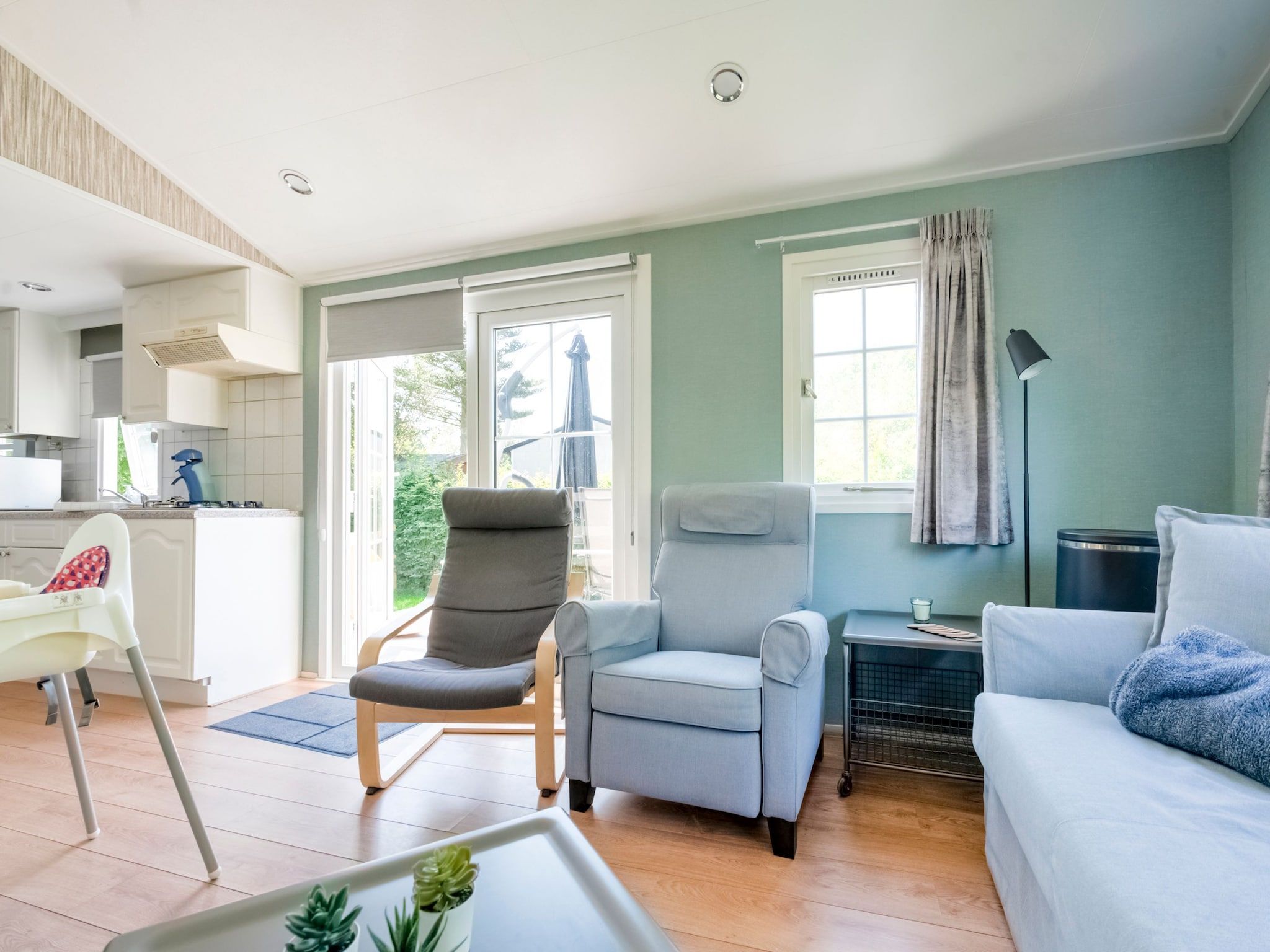 De woonkamer van Huisje 84 in Stegeren