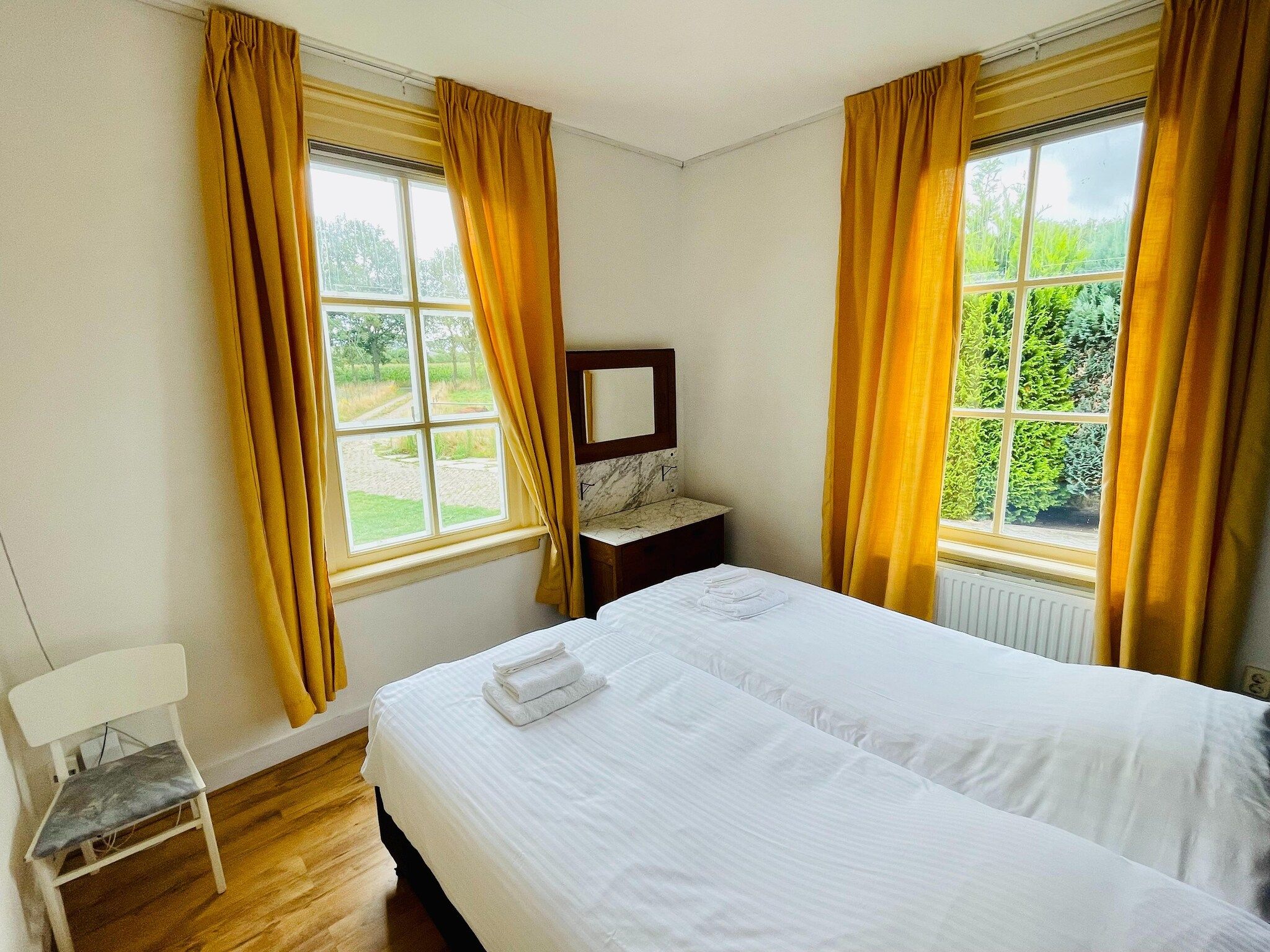 Een slaapkamer van Welskerveen 5 in De Heurne