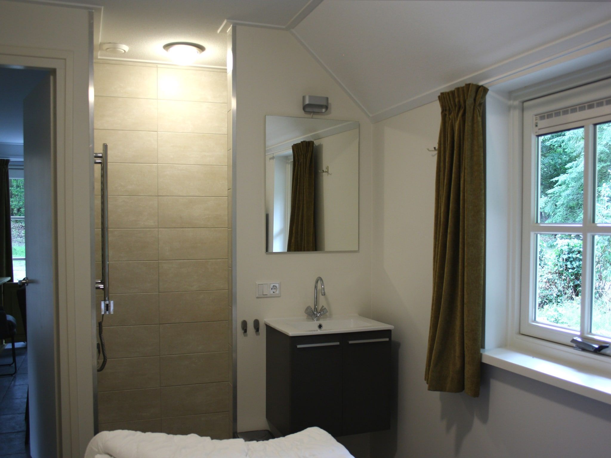 De badkamer van Vakantiepark Herperduin 16 in Herpen