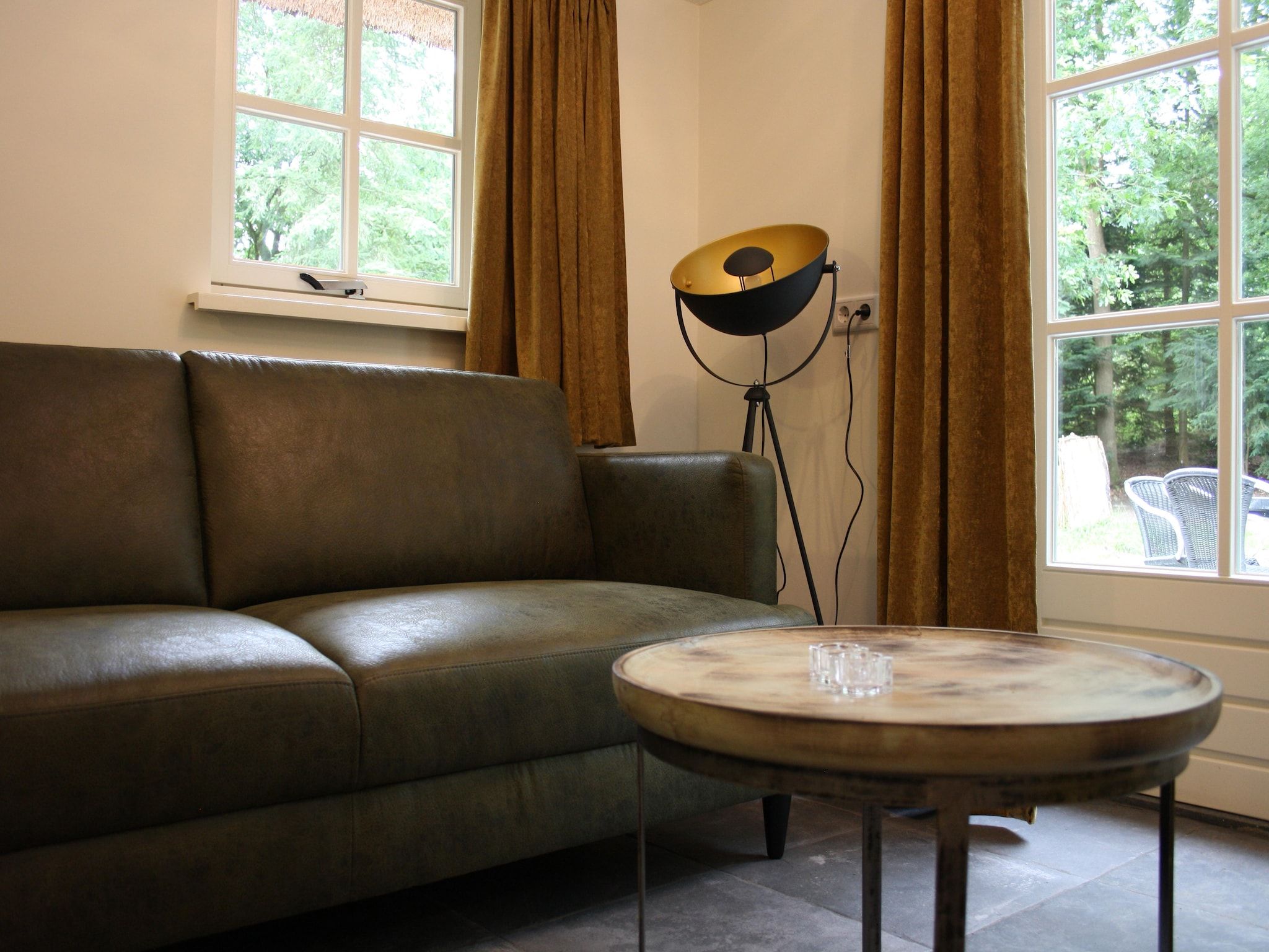 De woonkamer van Vakantiepark Herperduin 16 in Herpen