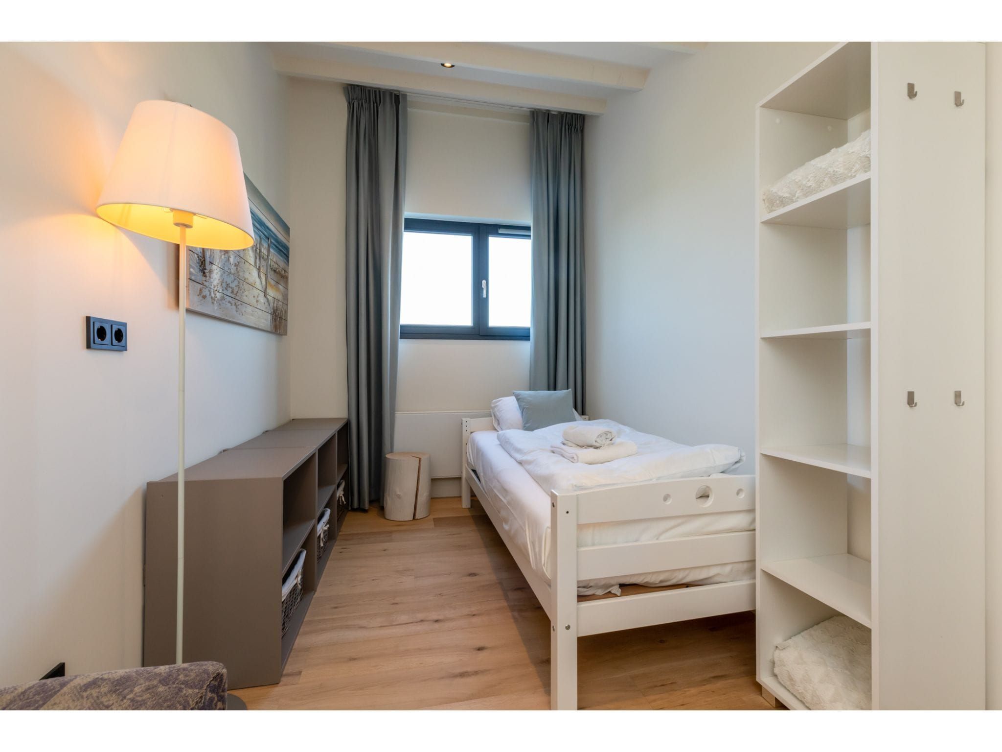 Een slaapkamer van Lepelblad 42 in Nieuwvliet-Bad