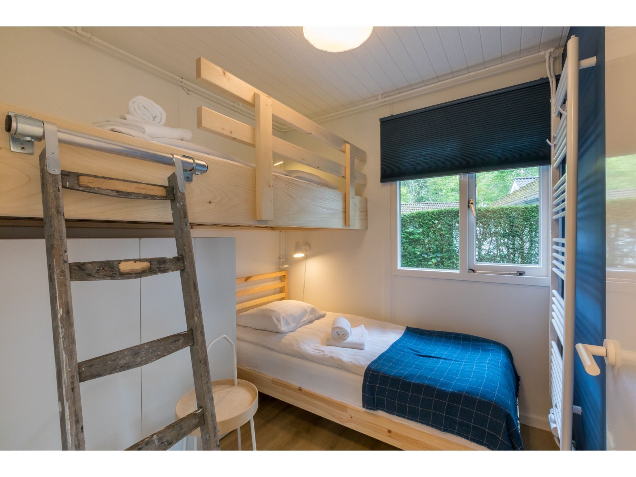 Een slaapkamer van Vakantiehuis Noordendolfer 2 huisje 49 in Zoutelande