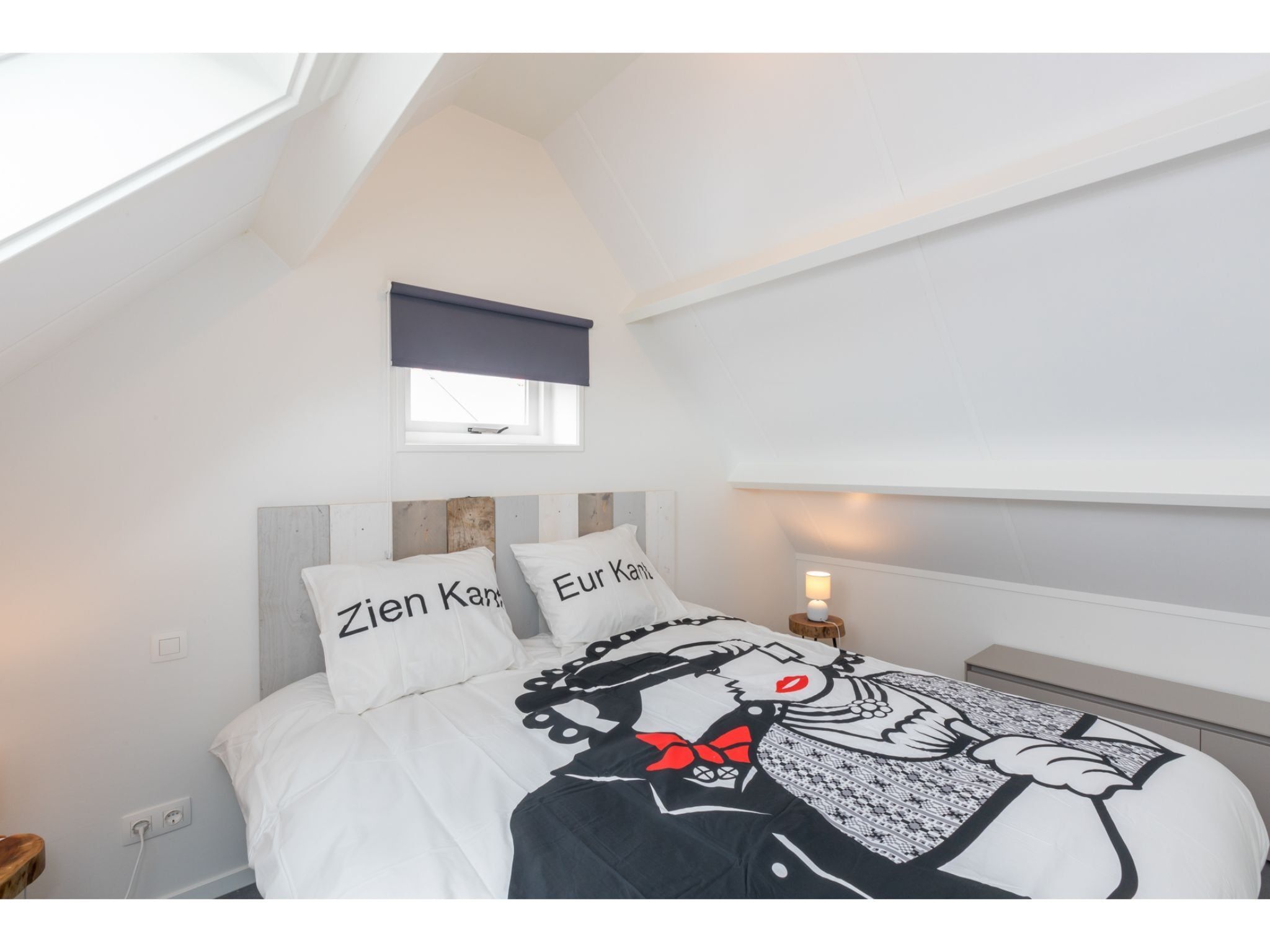 Een slaapkamer van Vakantiehuis Groeneweg 3 'Jikkemien in Koudekerke