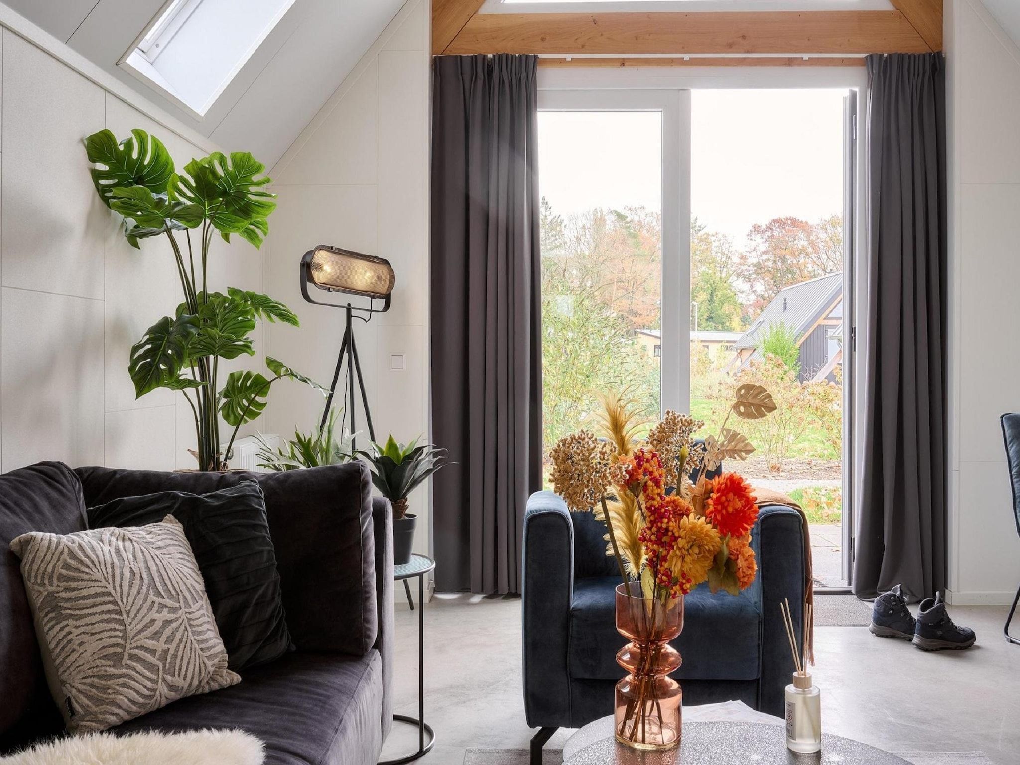 De woonkamer van Landgoed De IJsvogel 11 in Voorthuizen