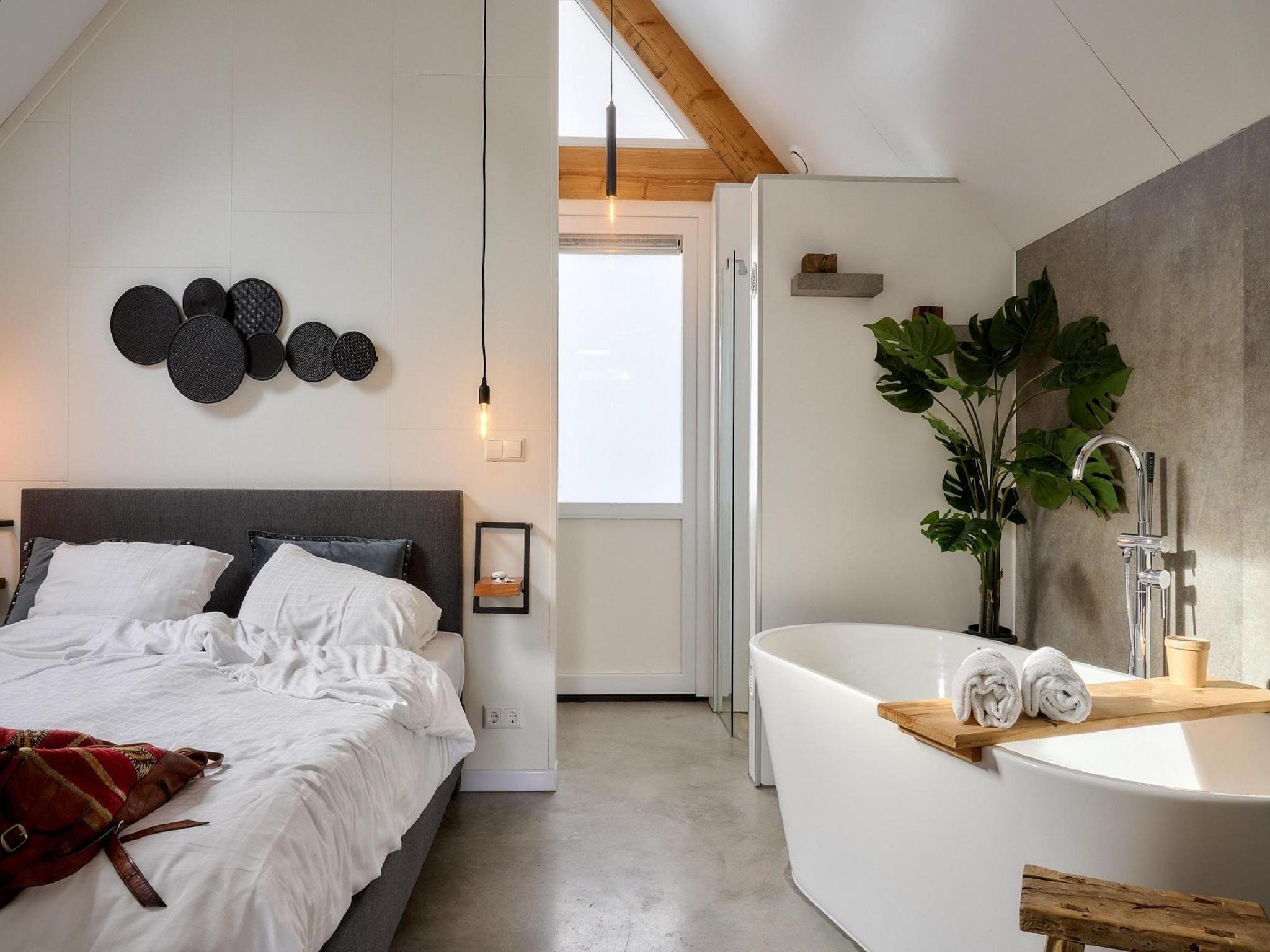 Een slaapkamer van Landgoed De IJsvogel 11 in Voorthuizen