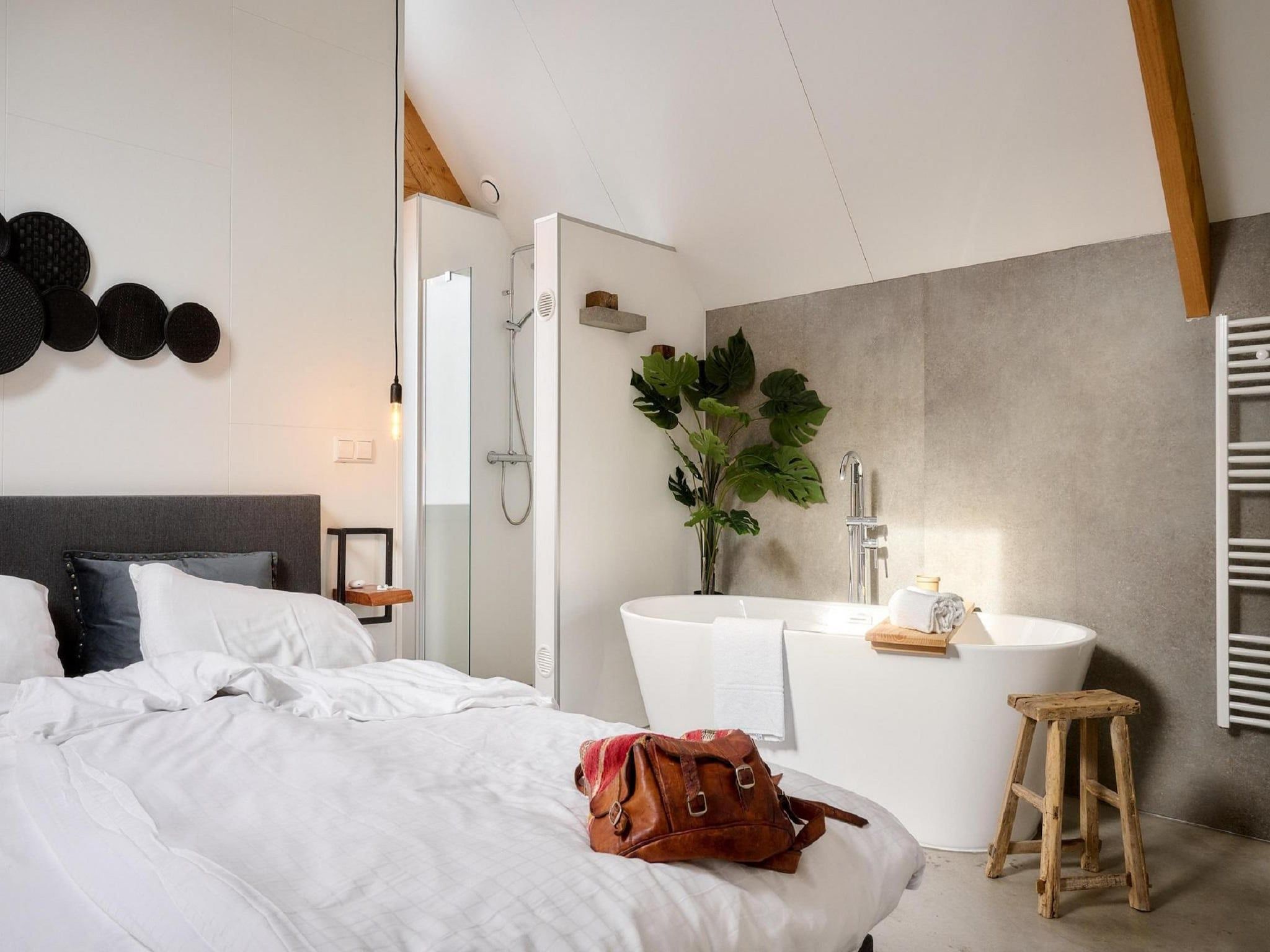 Een slaapkamer van Landgoed De IJsvogel 11 in Voorthuizen