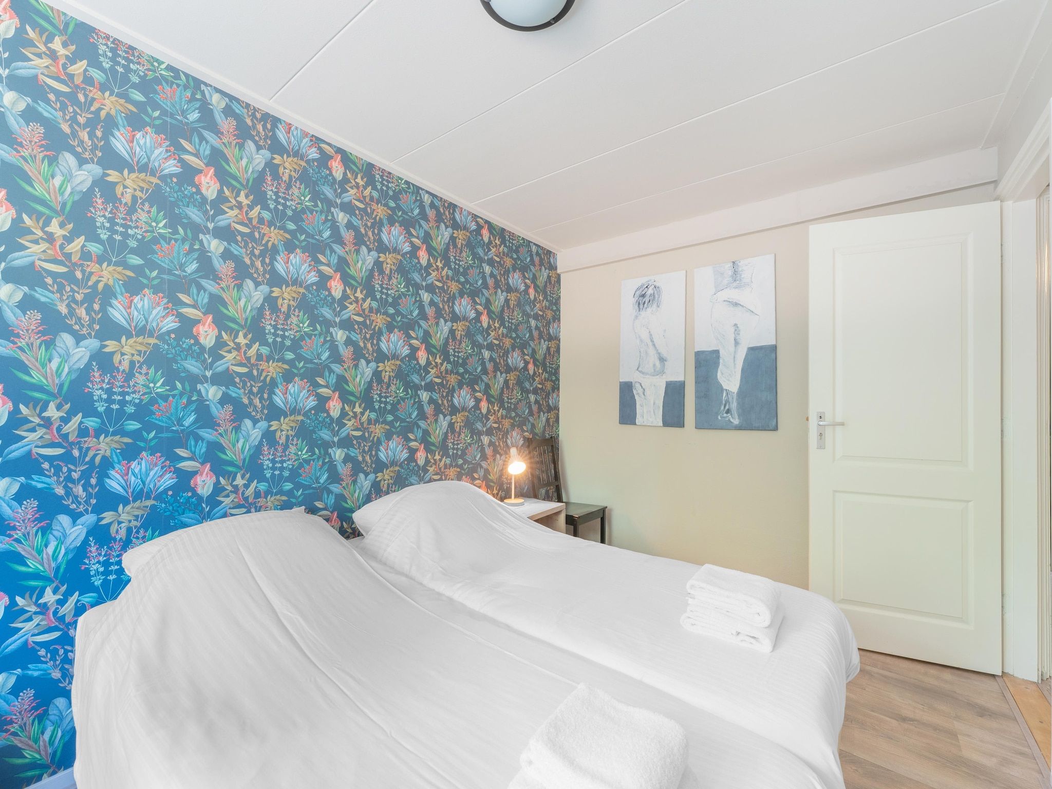 Een slaapkamer van Familiehuis Ruighenrode in Lochem