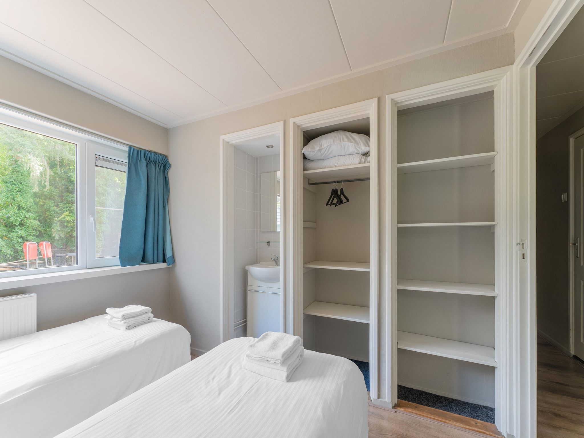 Een slaapkamer van Familiehuis Ruighenrode in Lochem