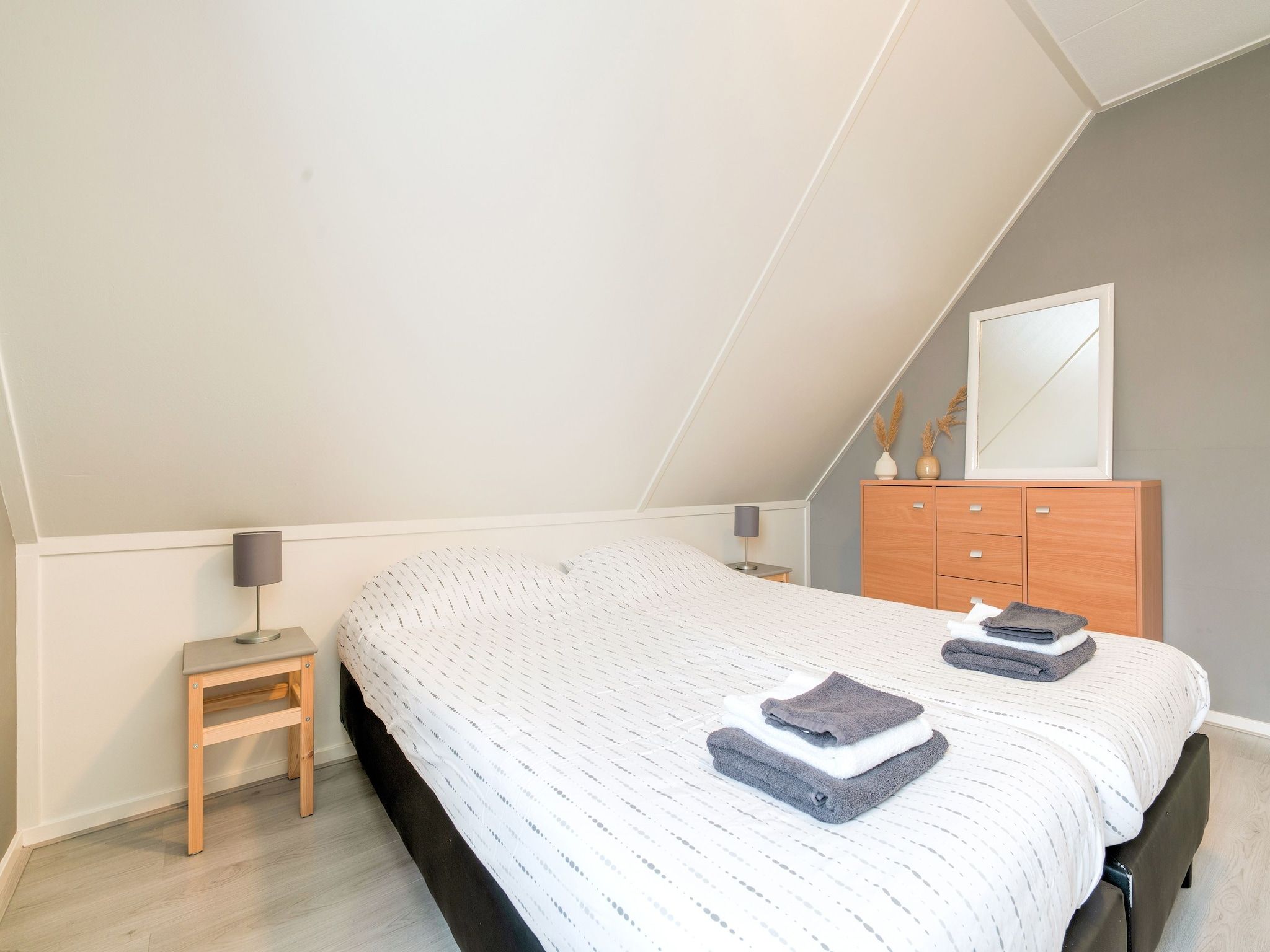 Een slaapkamer van Zonnig Hosterwold in Zeewolde