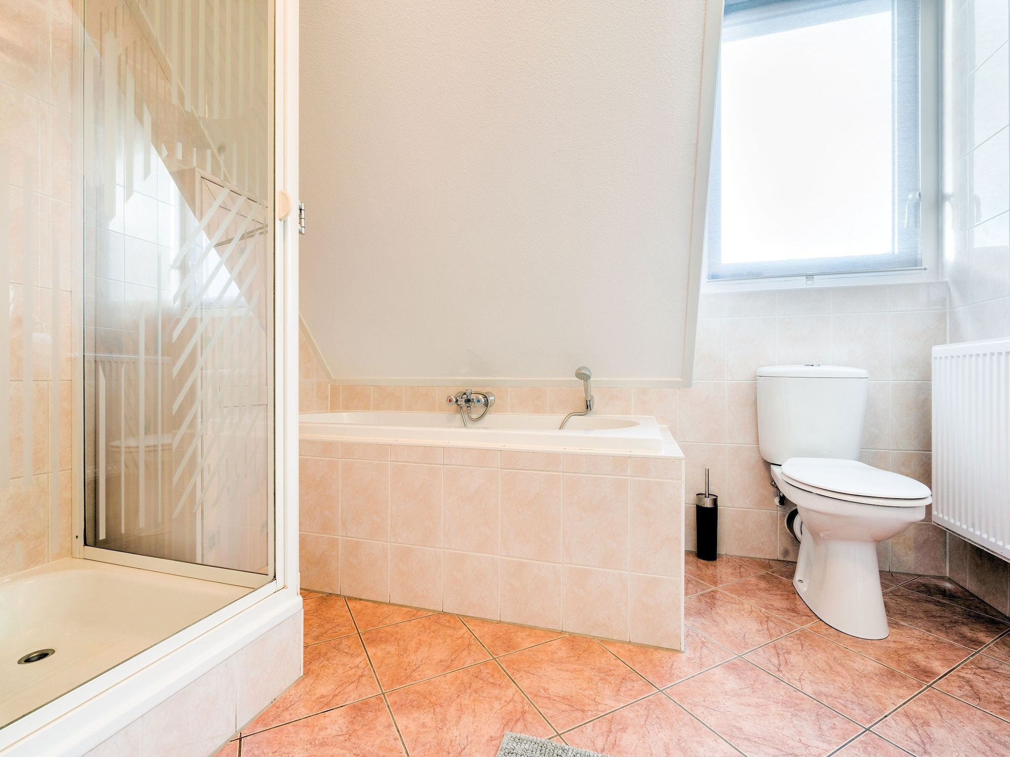 De badkamer van Zonnig Hosterwold in Zeewolde