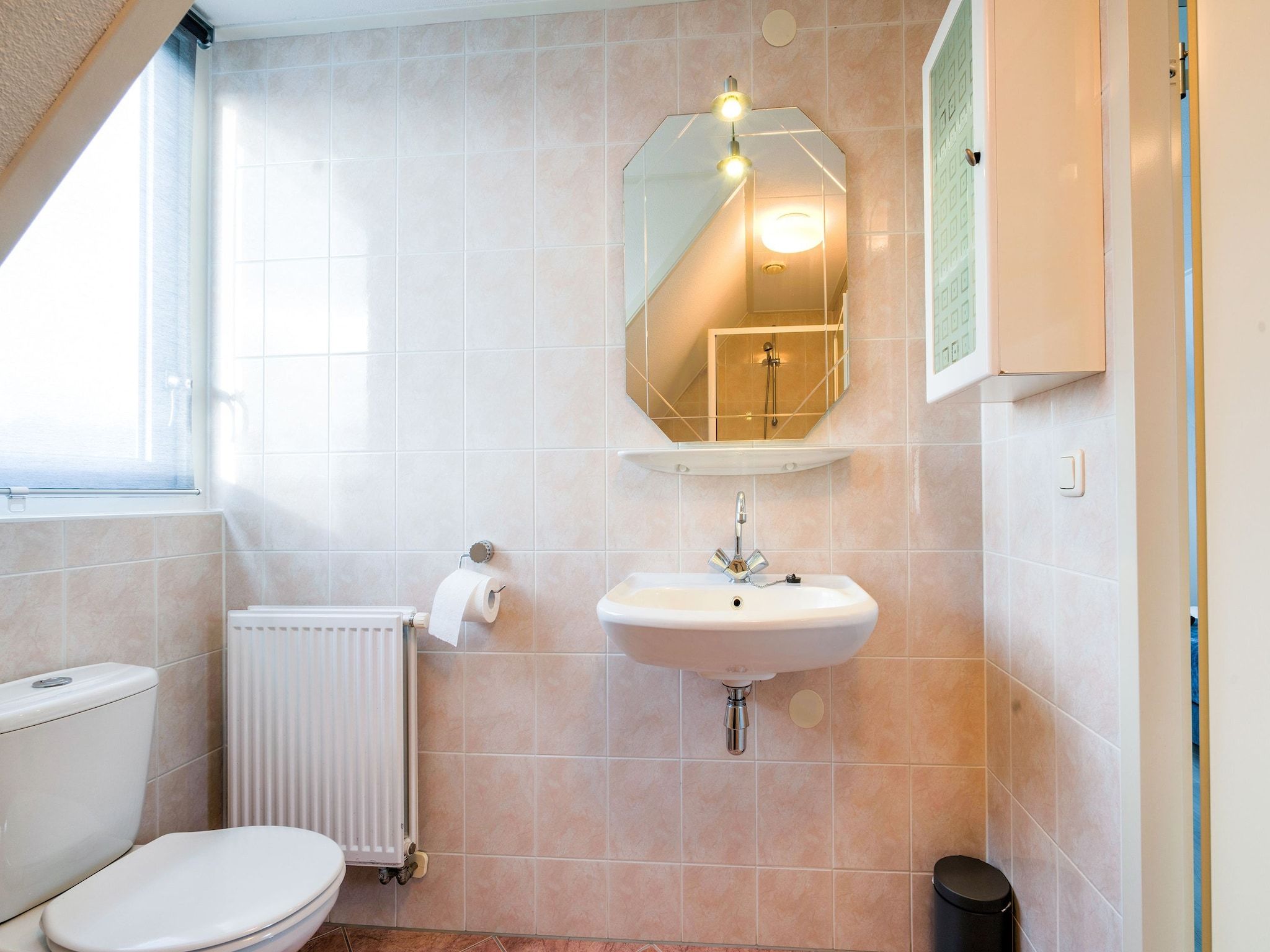 De badkamer van Zonnig Hosterwold in Zeewolde