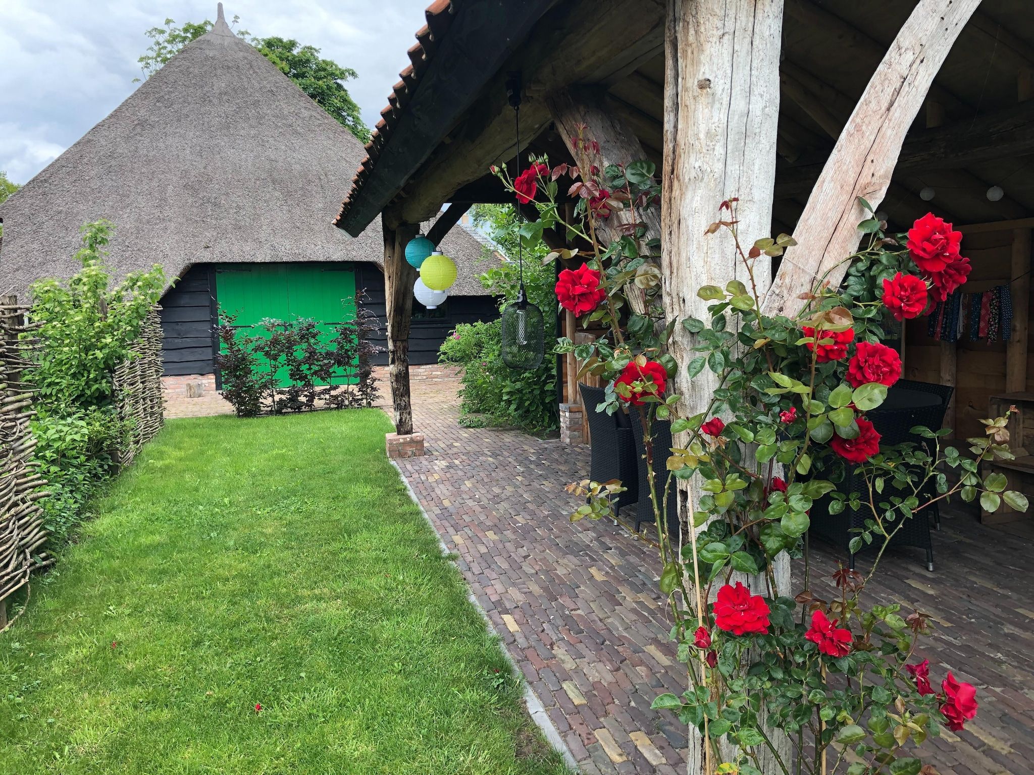 De tuin van woonboerderij in Staphorst voor 6 personen in Rouveen