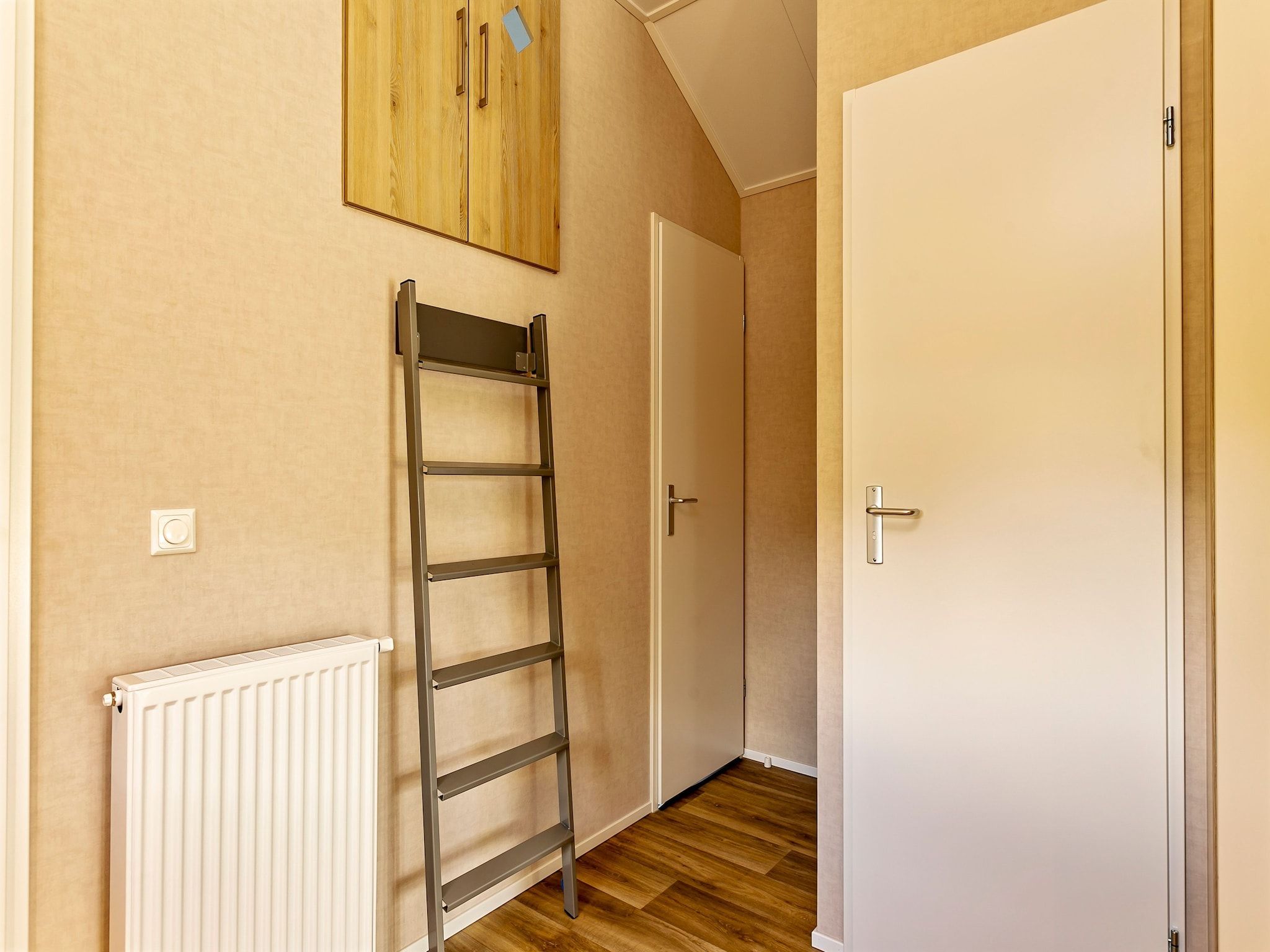 Een slaapkamer van Recreatiepark Tolplas 16 in Hoge Hexel