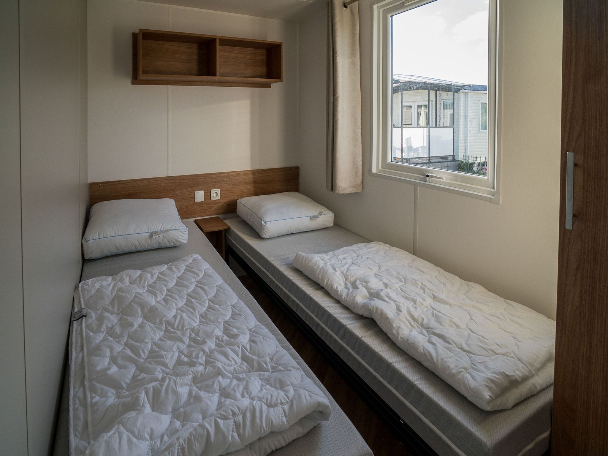 Een slaapkamer van Ocean Dreams Oostkapelle Zeeland M55 in Oostkapelle