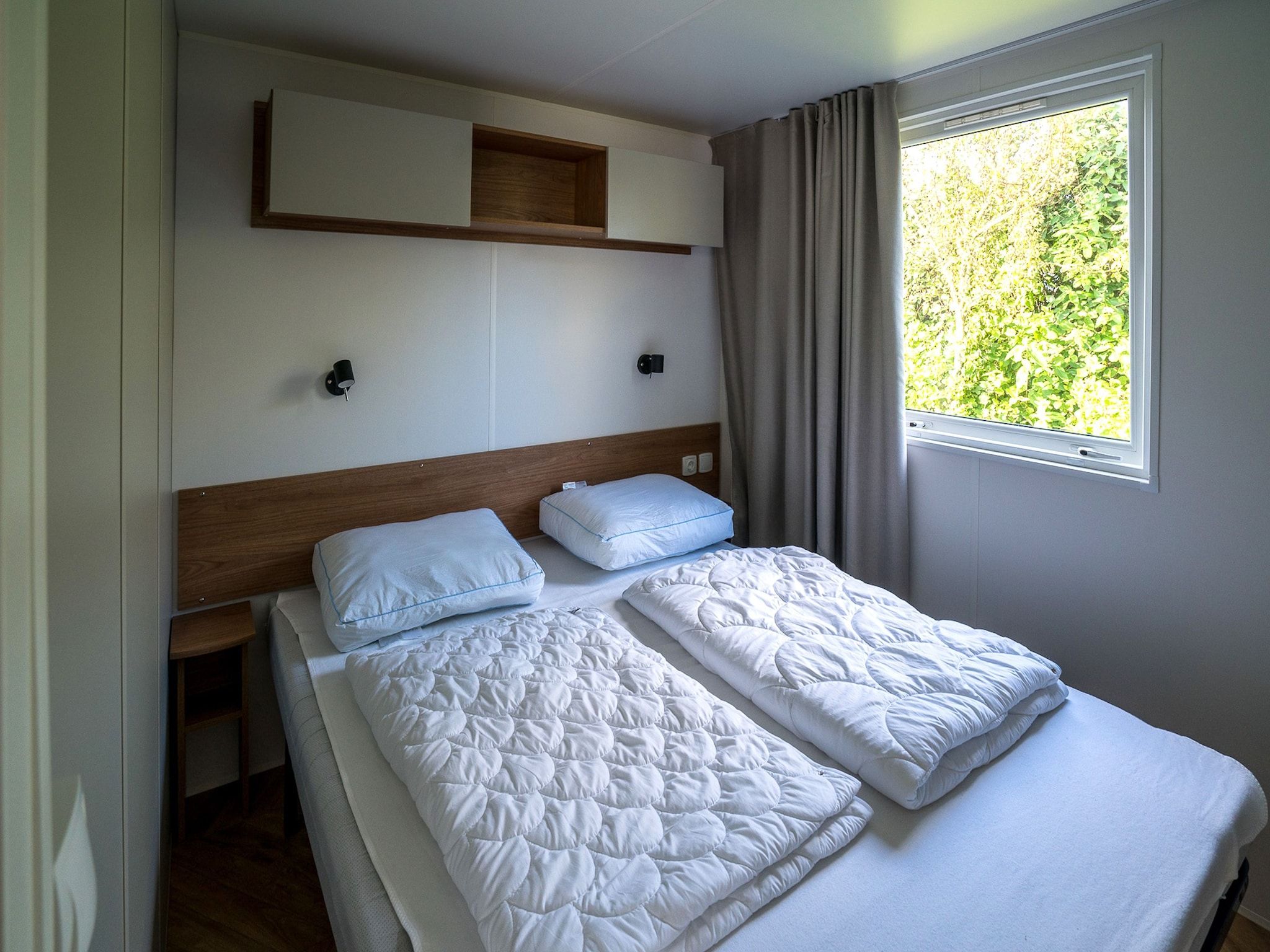 Een slaapkamer van Ocean Dreams Oostkapelle Zeeland M55 in Oostkapelle