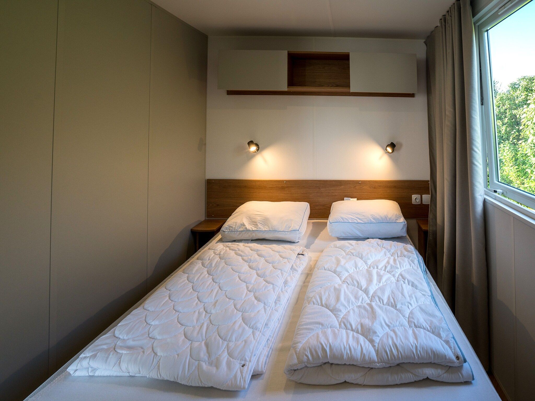 Een slaapkamer van Ocean Dreams Oostkapelle Zeeland M55 in Oostkapelle