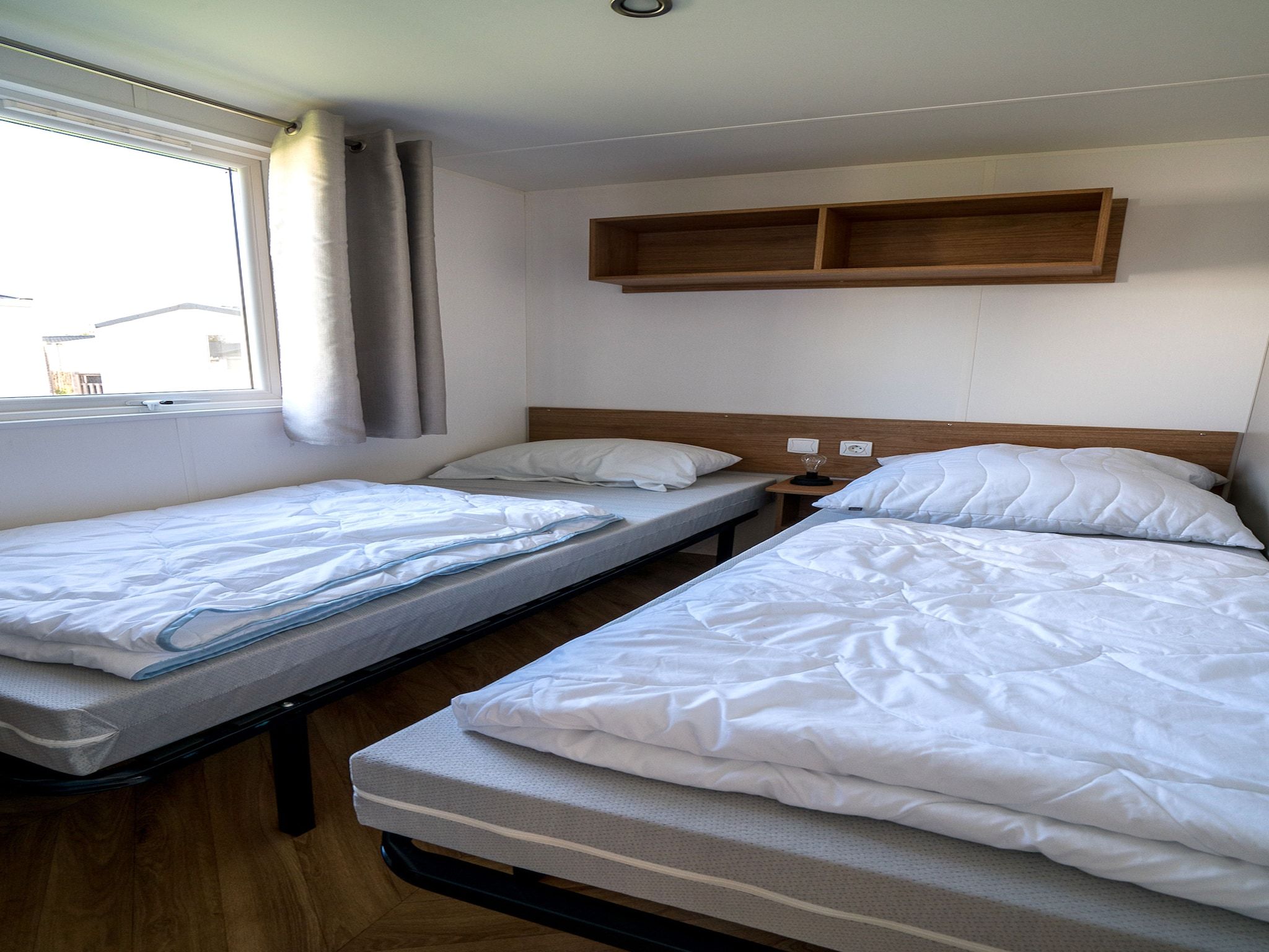 Een slaapkamer van Ocean Dreams Oostkapelle Zeeland M55 in Oostkapelle