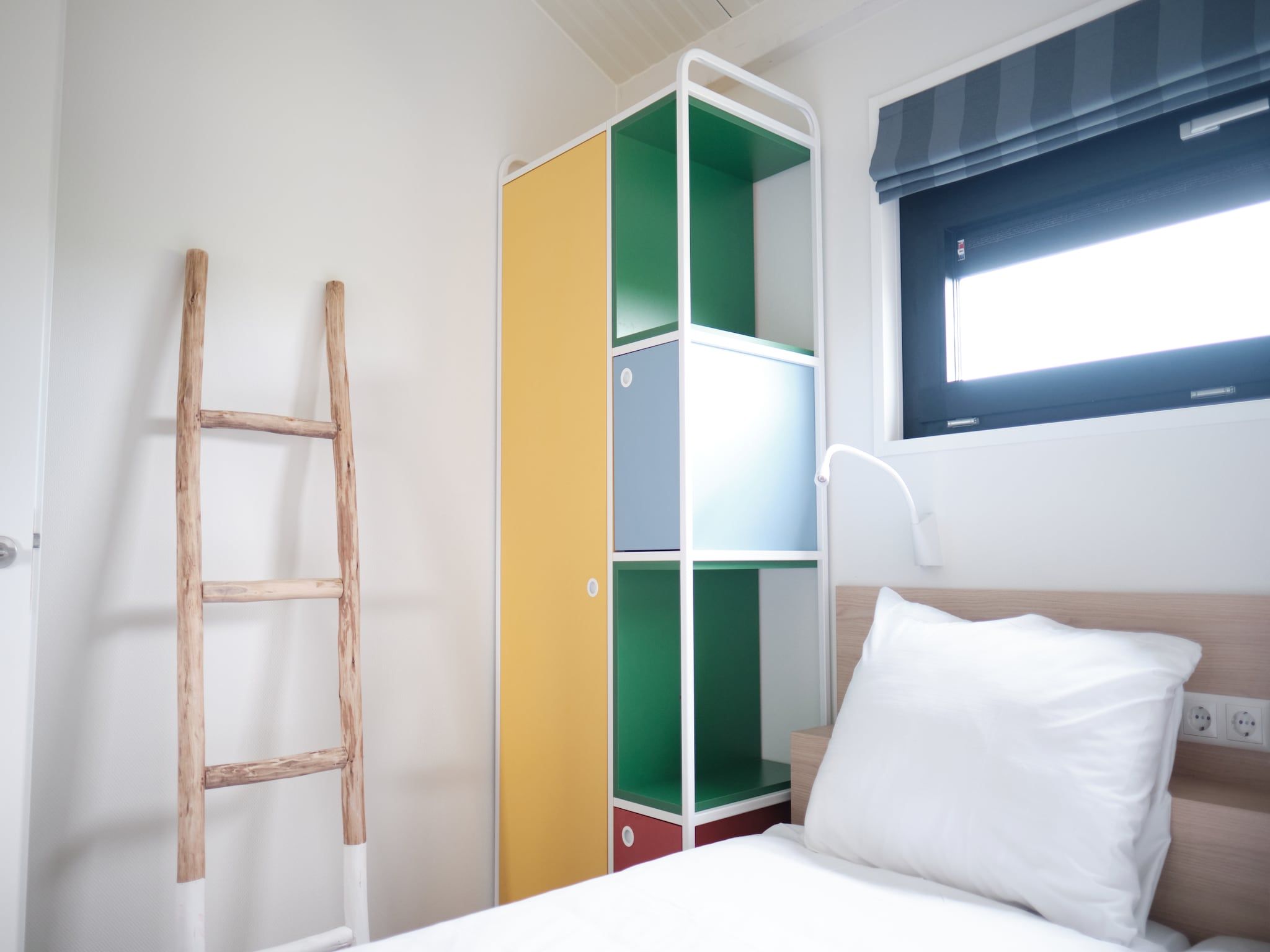 Een slaapkamer van Resort Callantsoog 1 in Callantsoog