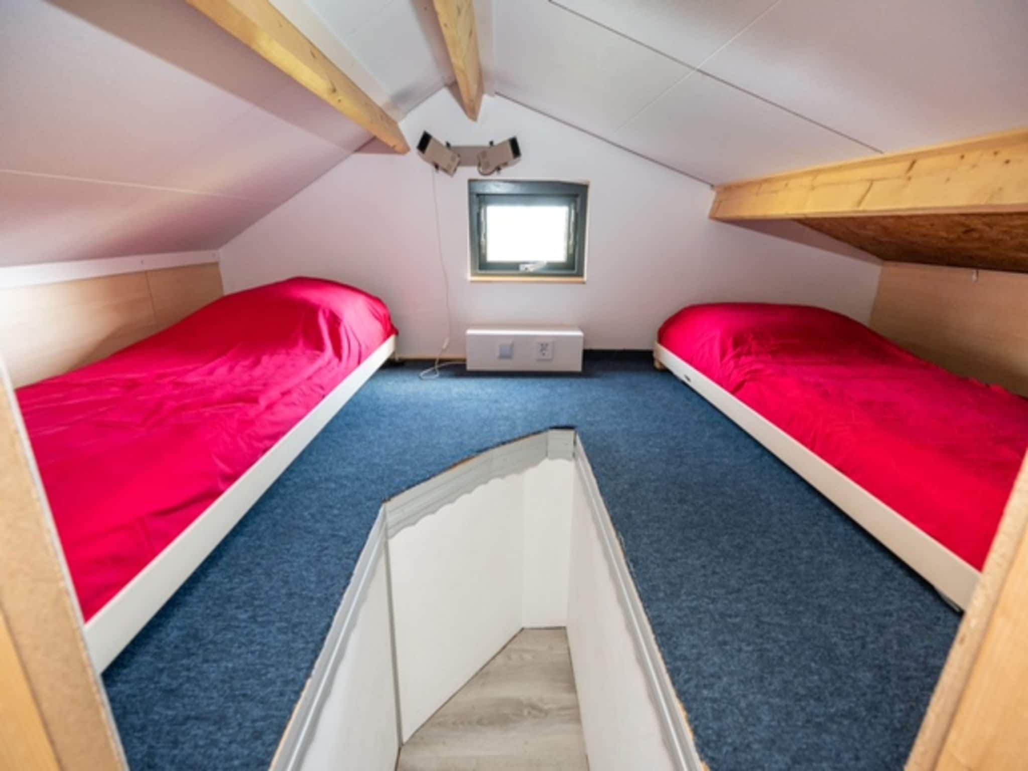 Een slaapkamer van Chalet Sea Rocks in Goedereede