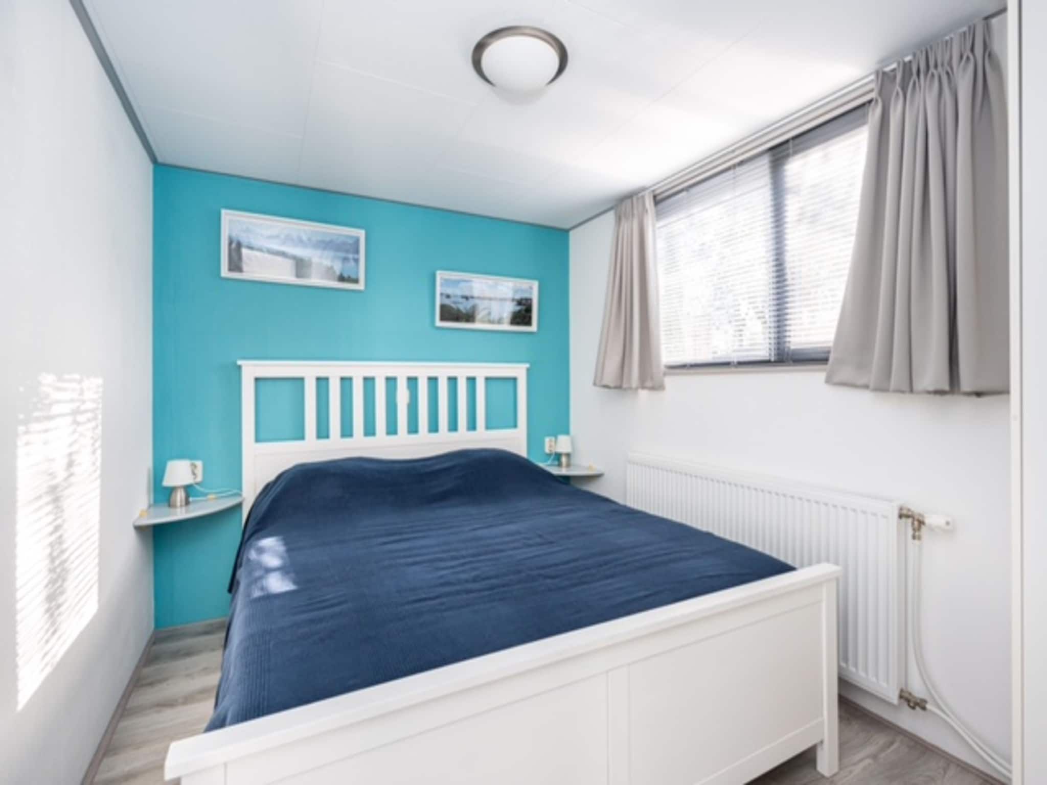 Een slaapkamer van Chalet Sea Rocks in Goedereede