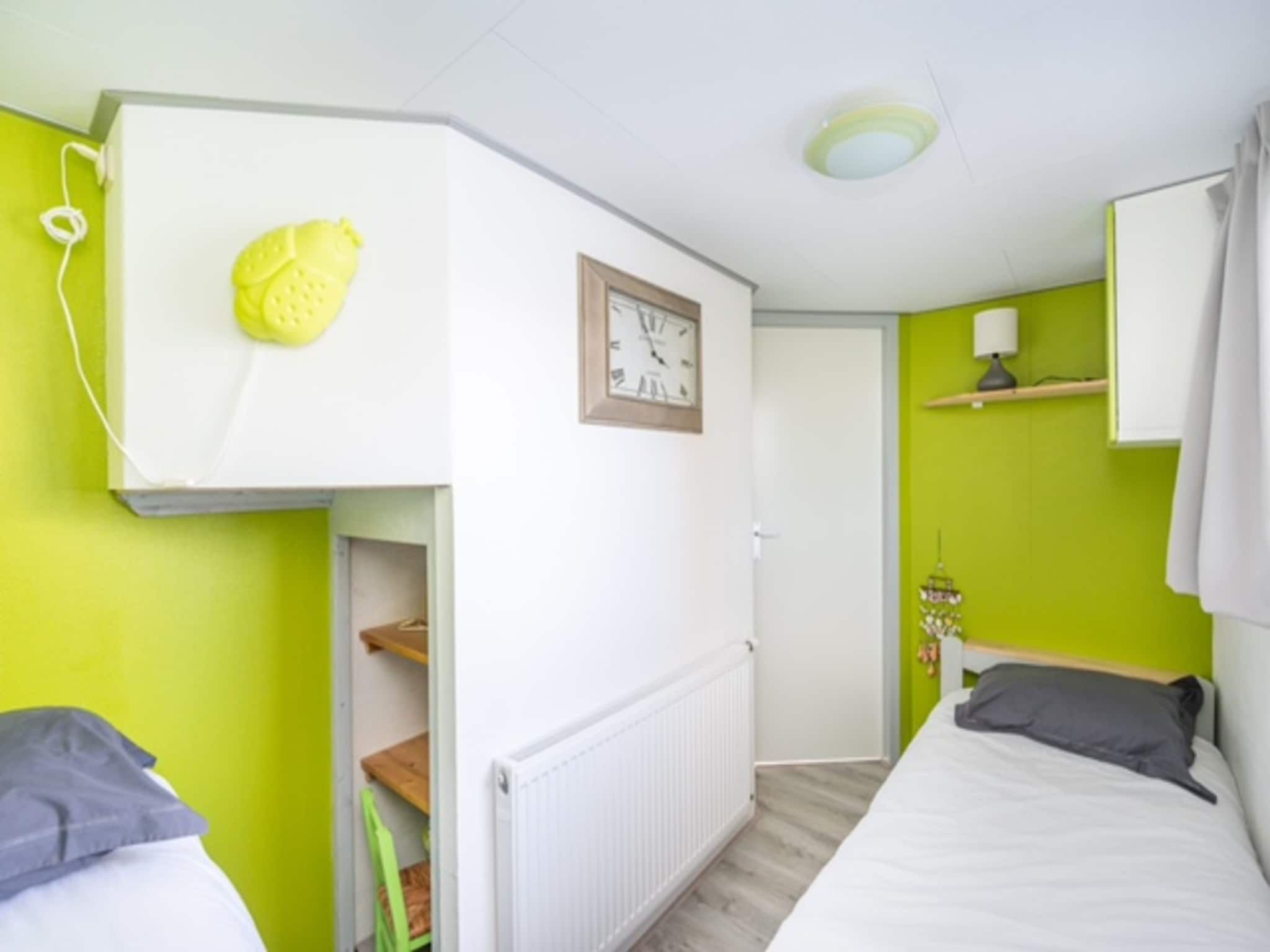 Een slaapkamer van Chalet Sea Rocks in Goedereede