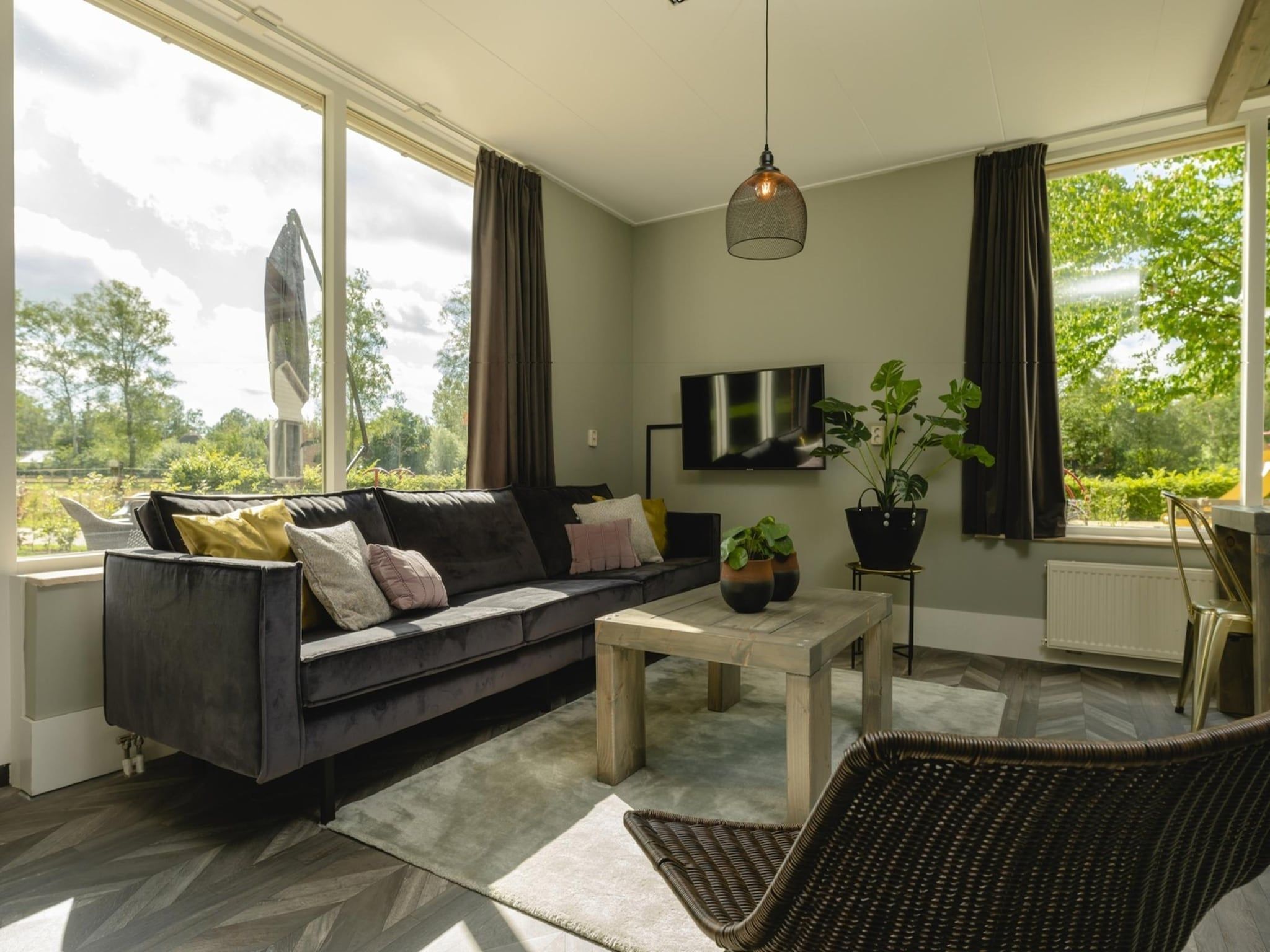 De woonkamer van Vakantiepark Mölke 18 in Zuna