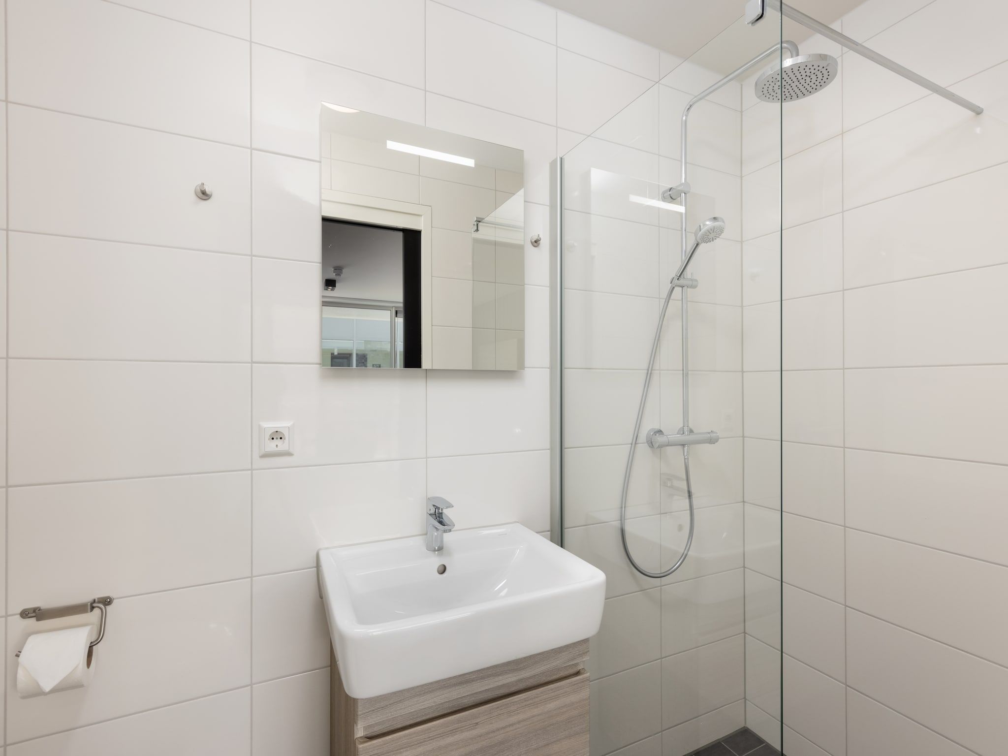 De badkamer van Residentie de Graaf van Egmont 10 in Egmond aan zee