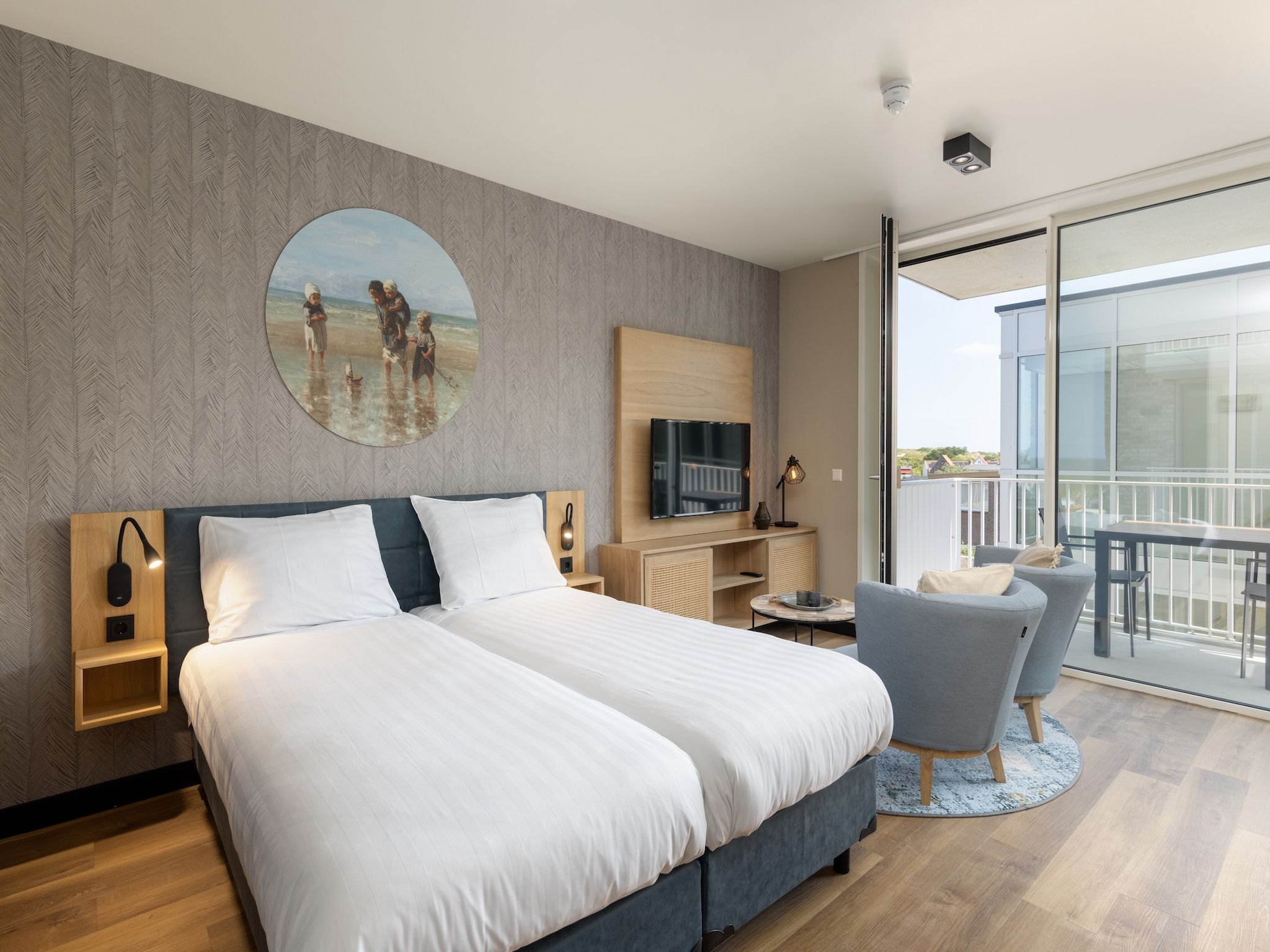 Een slaapkamer van Residentie de Graaf van Egmont 13 in Egmond aan zee