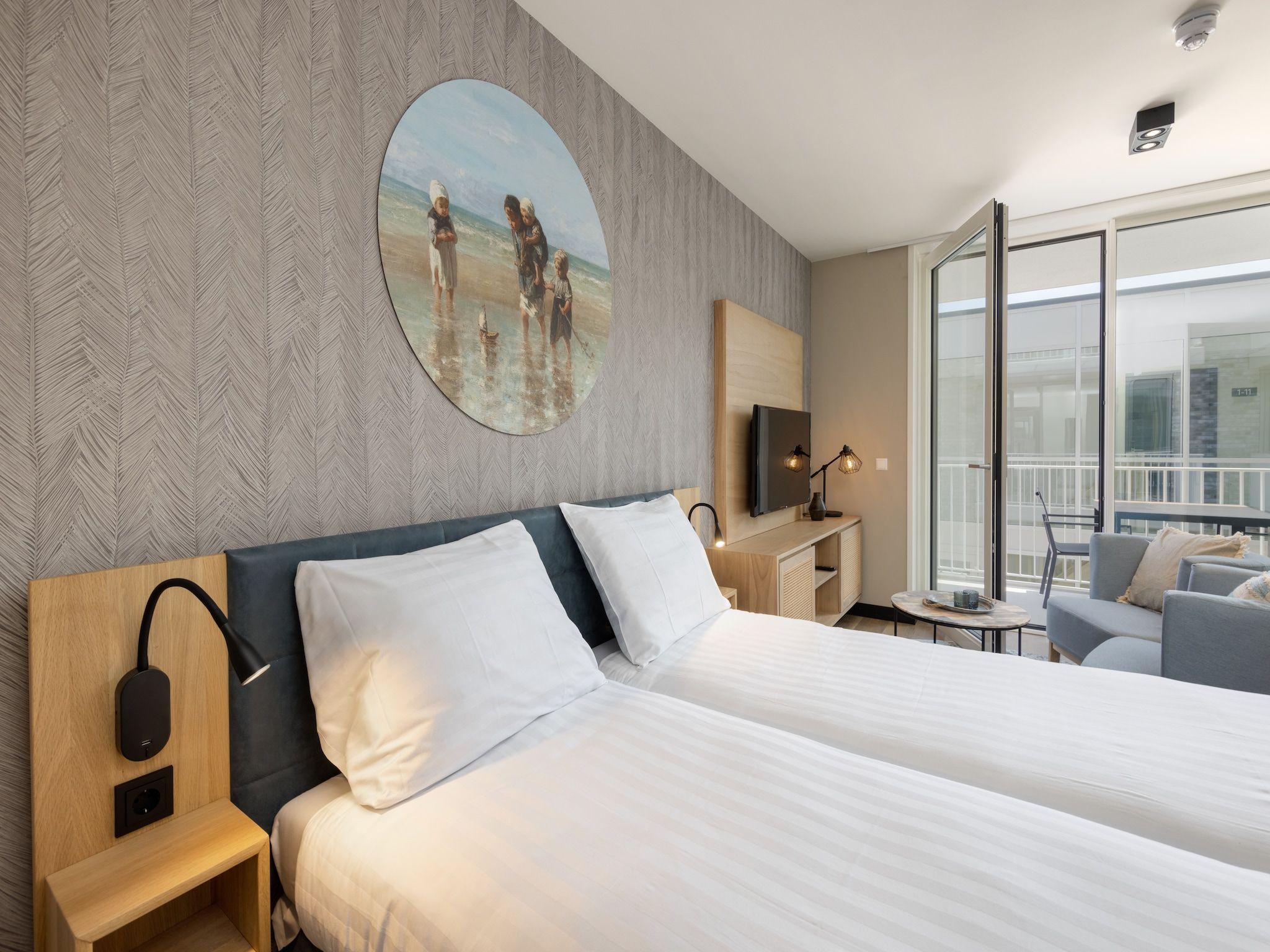 Een slaapkamer van Residentie de Graaf van Egmont 13 in Egmond aan zee