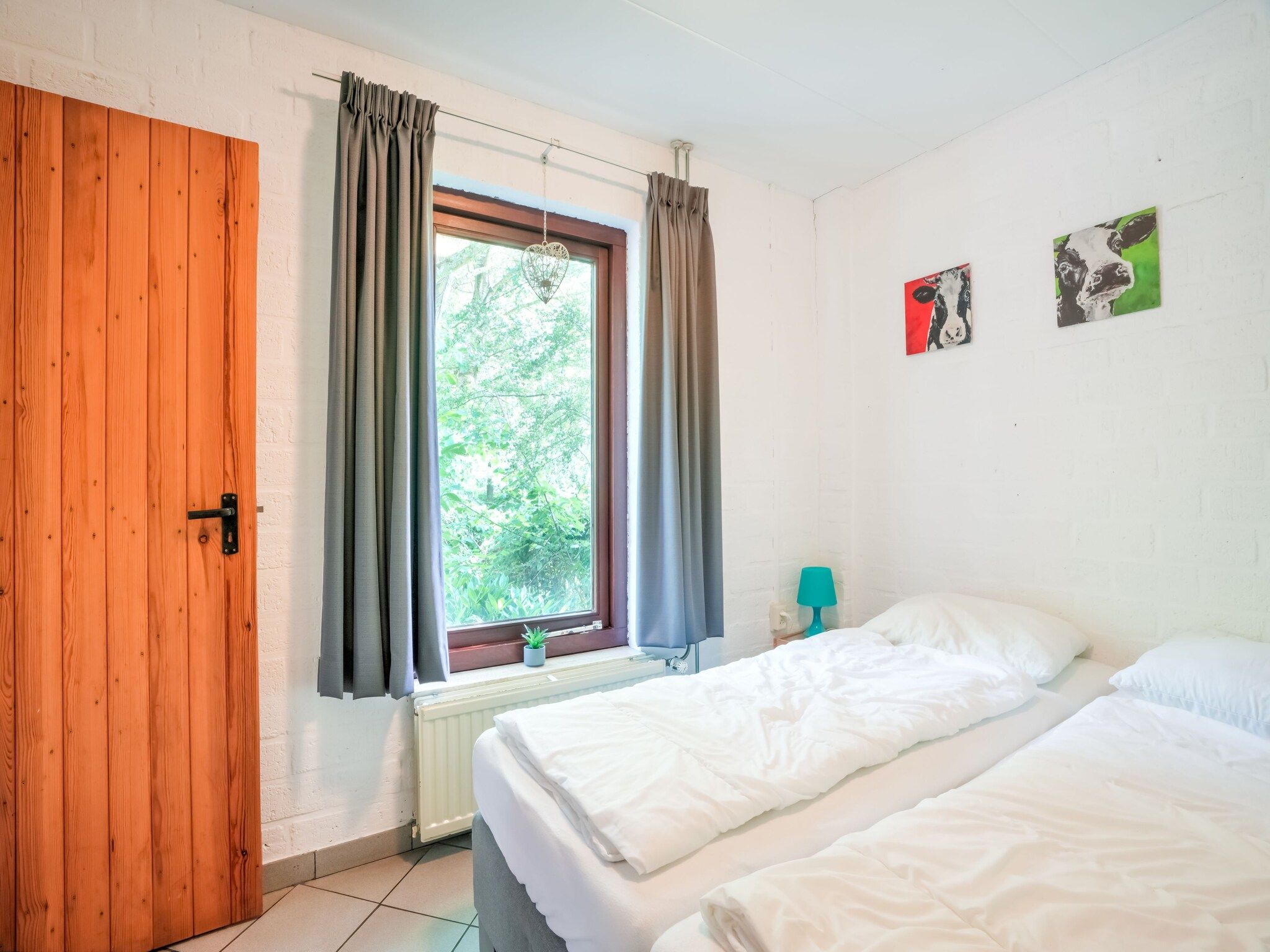 Een slaapkamer van Waterval 8P in Ulestraten