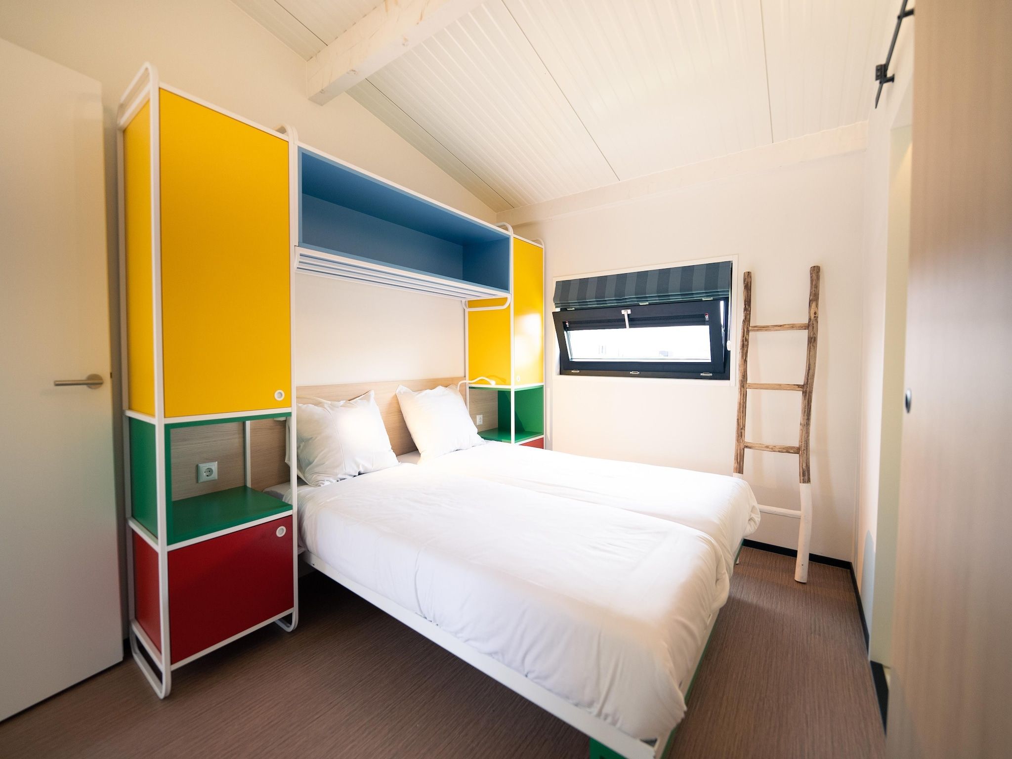 Een slaapkamer van Resort Callantsoog 3 in Callantsoog