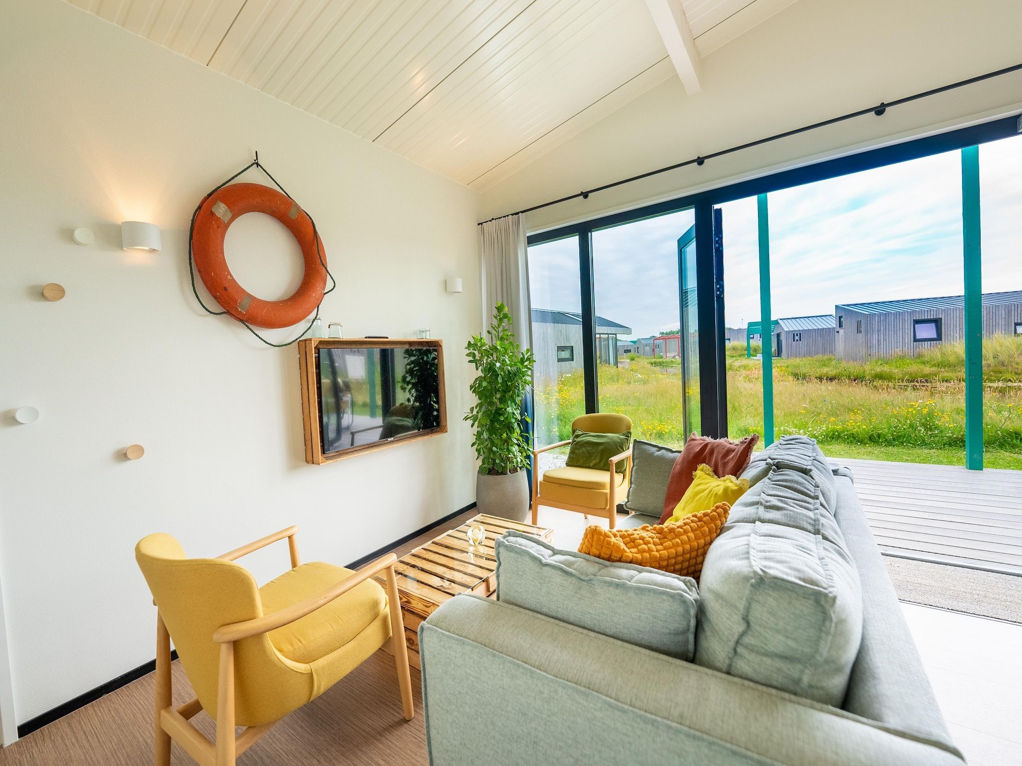 De woonkamer van Resort Callantsoog 3 in Callantsoog