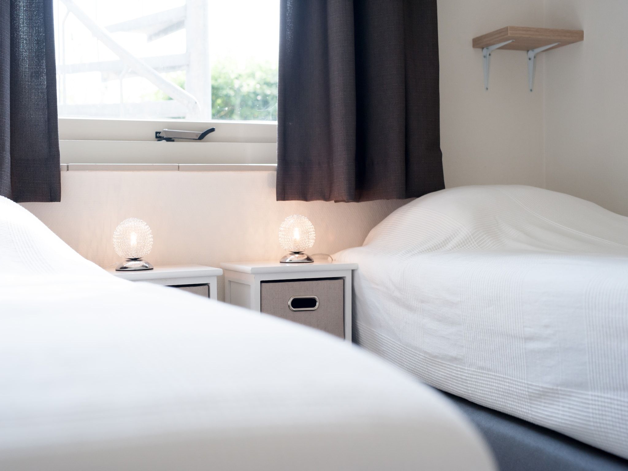 Een slaapkamer van Ostrea 34 in Kamperland