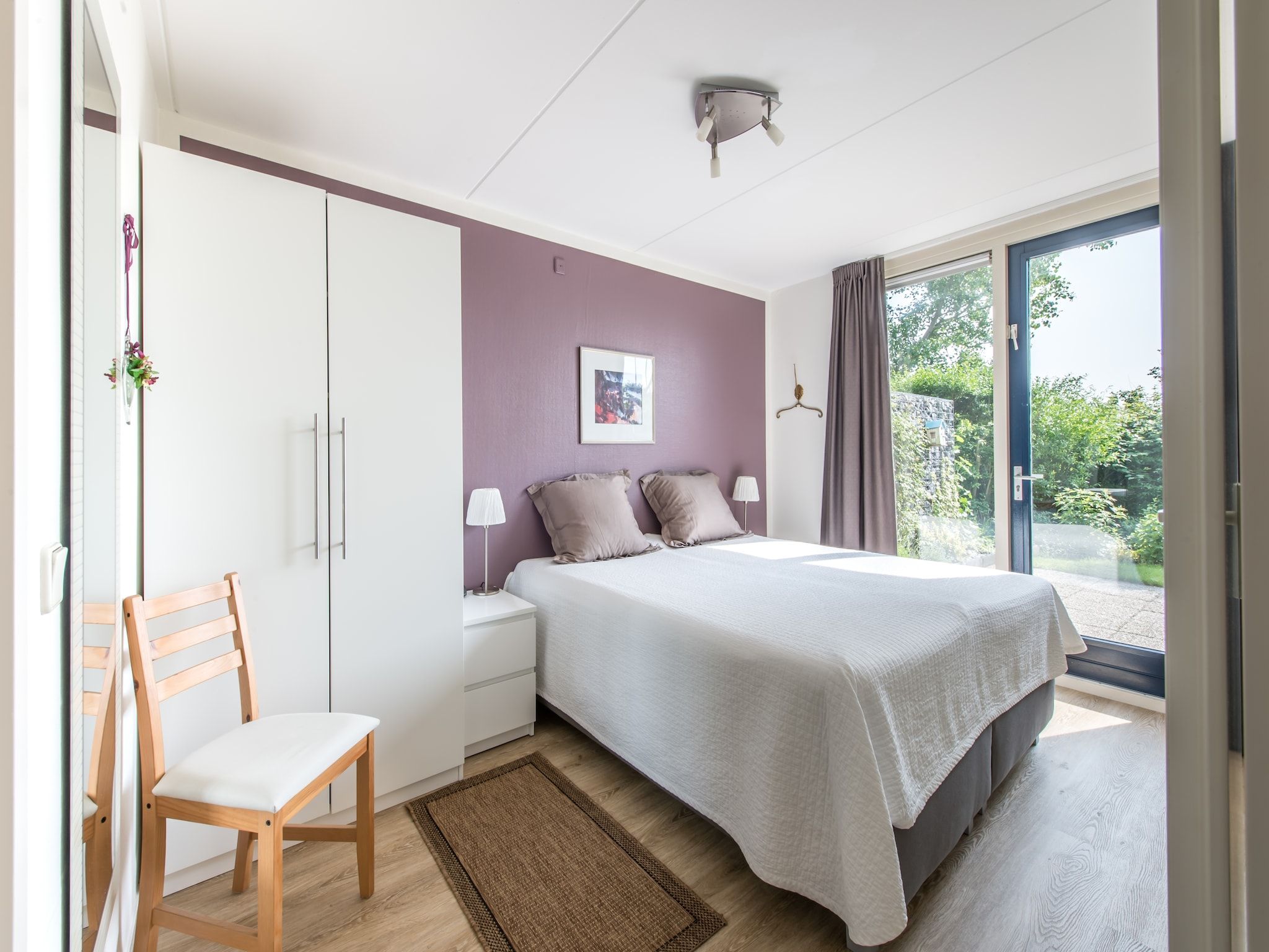 Een slaapkamer van Ostrea 34 in Kamperland