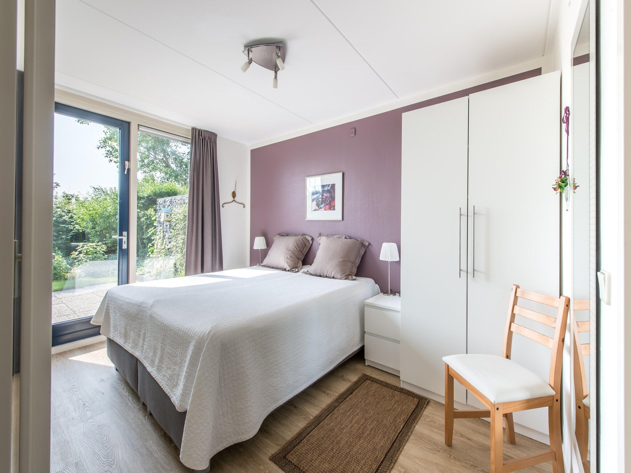 Een slaapkamer van Ostrea 34 in Kamperland