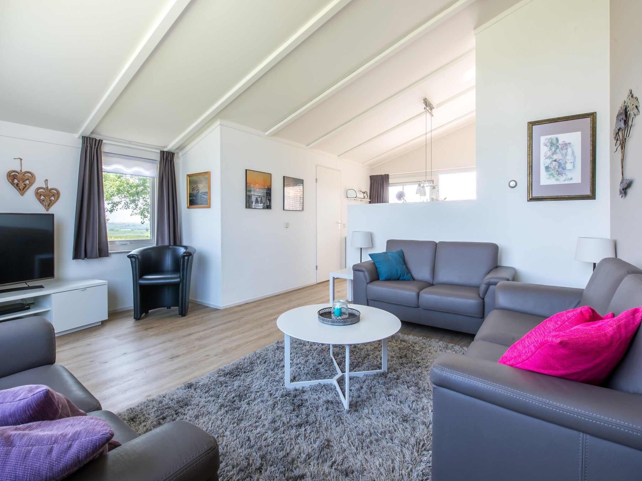 De woonkamer van Ostrea 34 in Kamperland