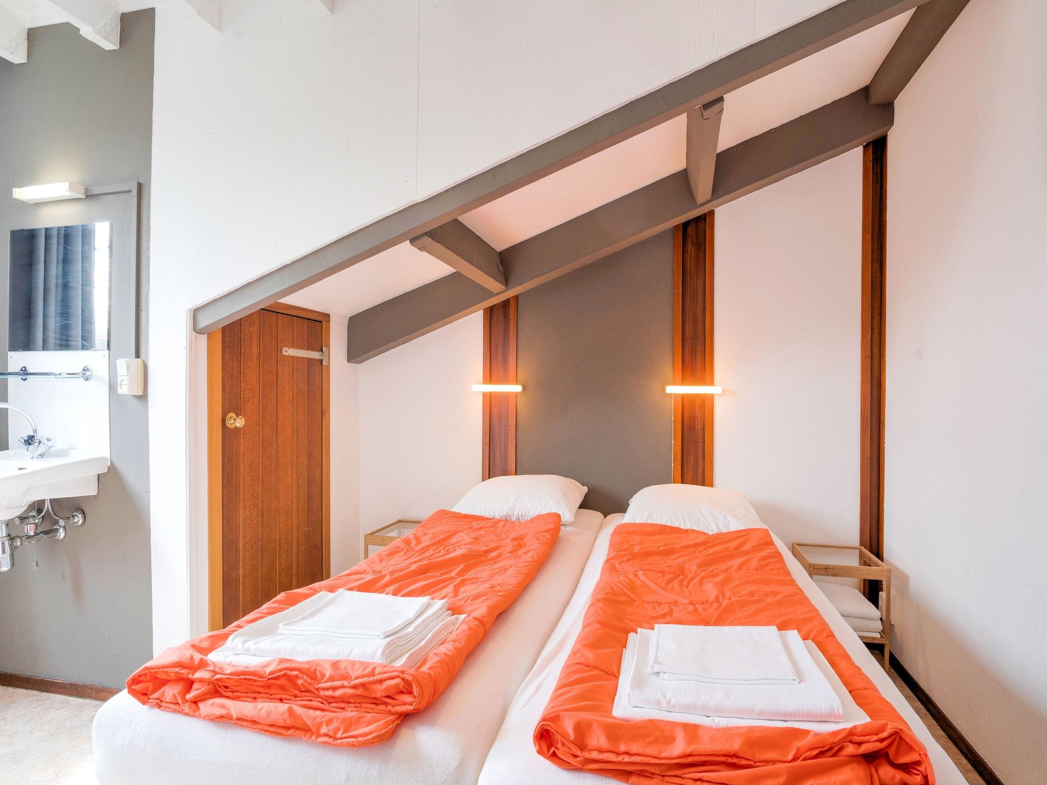 Een slaapkamer van Vliek 14P in Ulestraten