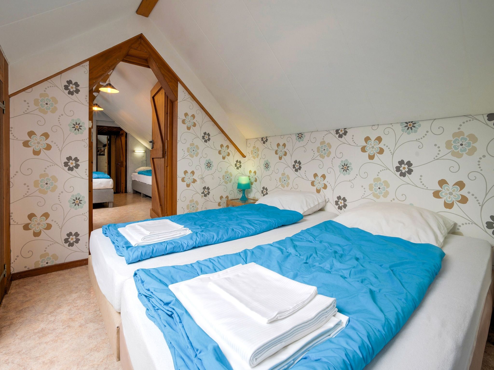 Een slaapkamer van De Wingerd 10P in Ulestraten